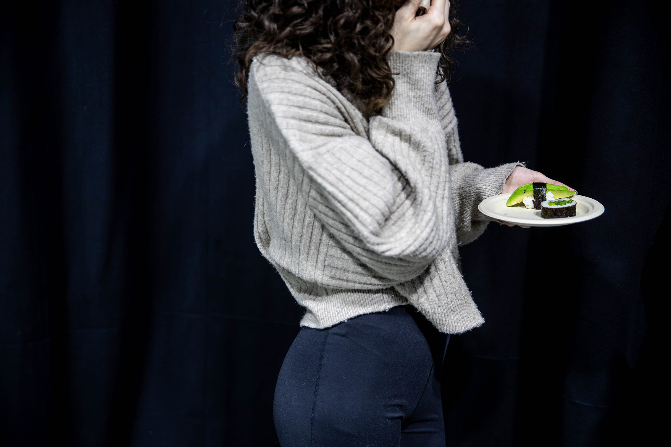 Hope Phillips refuels ahead of the last show they're booked for on Day One of New Zealand Fashion Week: Kahuria. Photo / Michael Craig