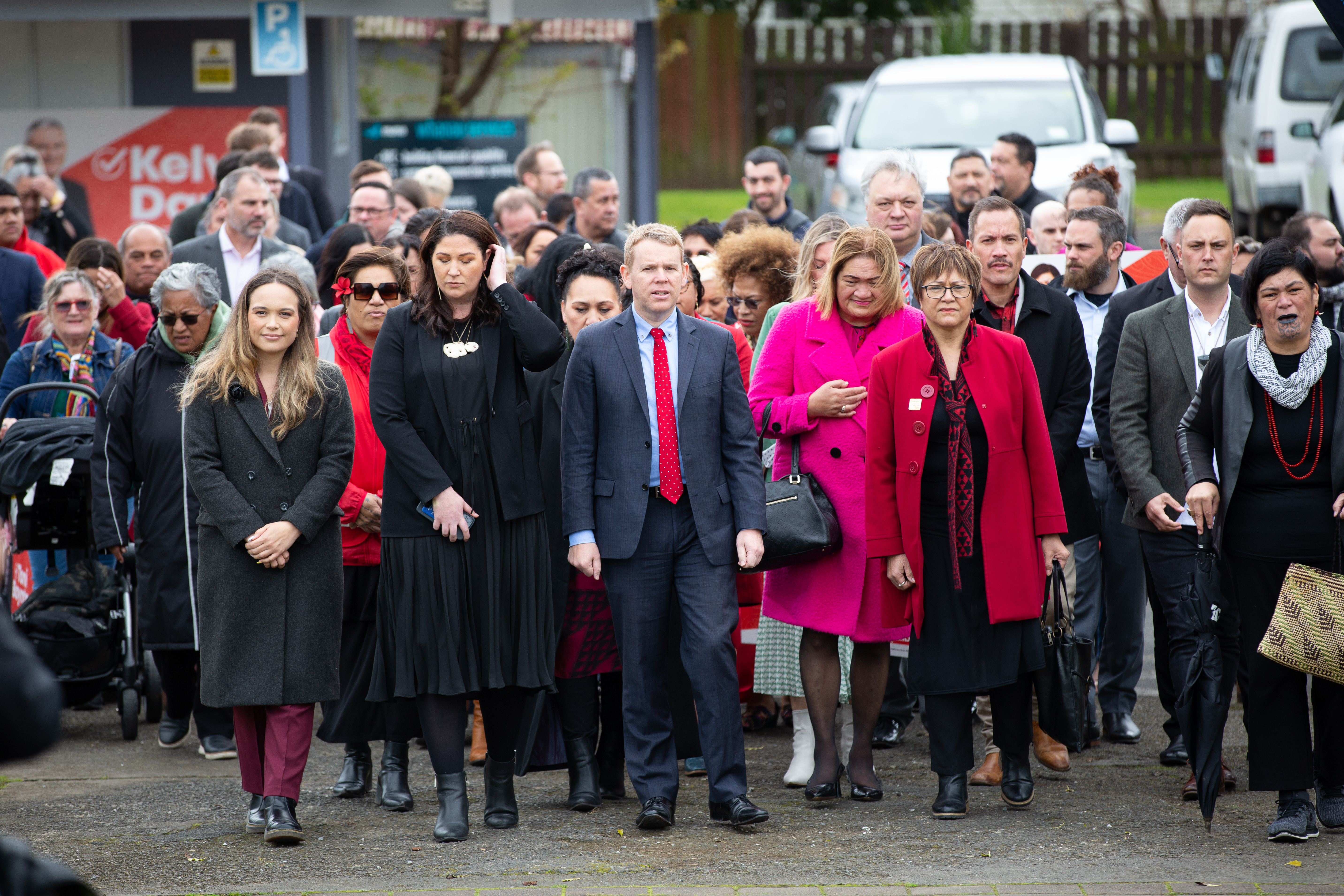 Prime Minister Chris Hipkins flanked by Willow-Jean Prime and Soraya Peke-Mason and surrounded by his MPs and ministers at Ngā Whare Waatea Marae in Mangere, Auckland, for Labour's Māori campaign launch. Photo / Sylvie Whinray