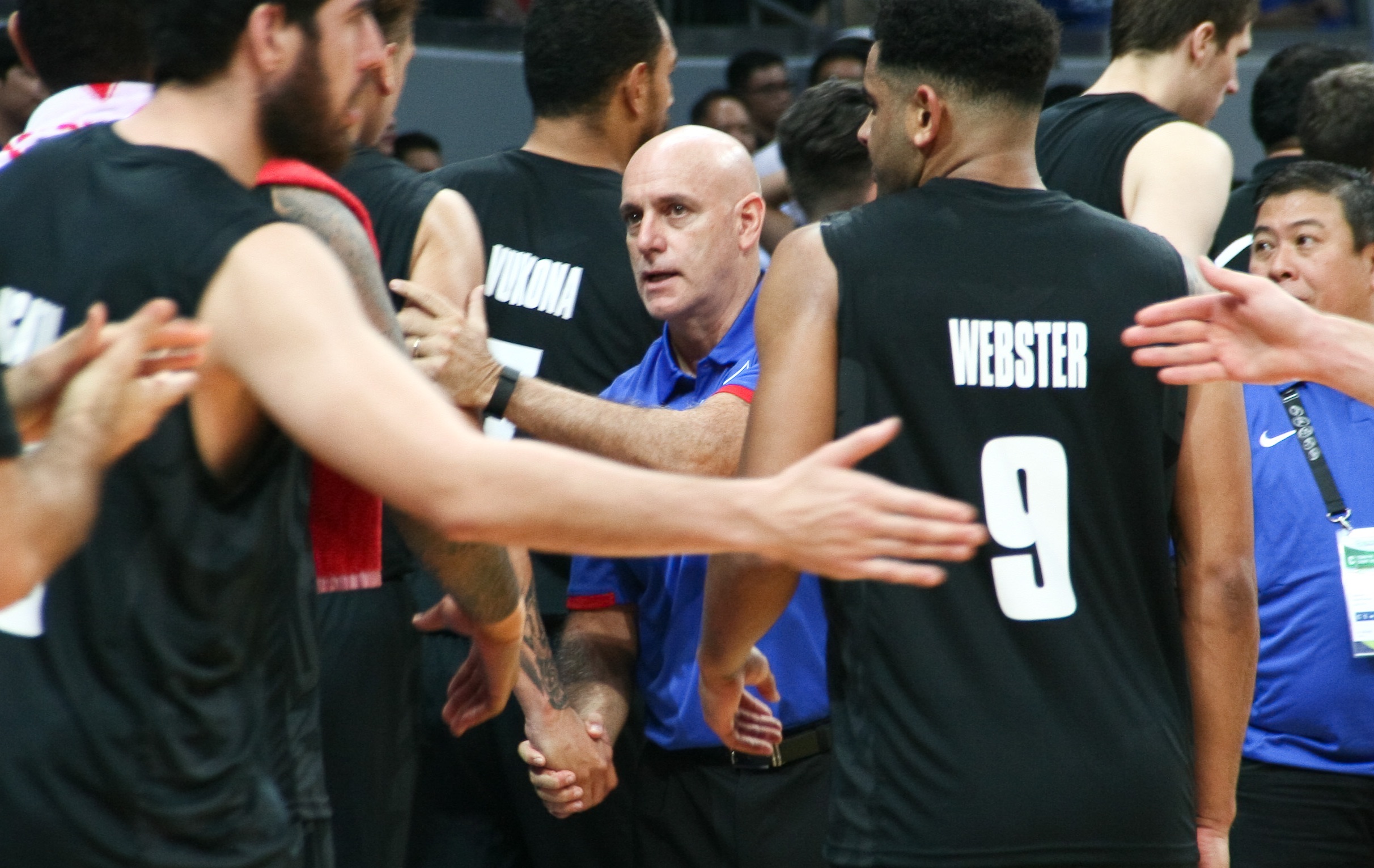 Tab Baldwin during his time as Philippines coach shaking hands with Tall Blacks players after an Olympics qualifying game in 2016. Photo / Getty Images