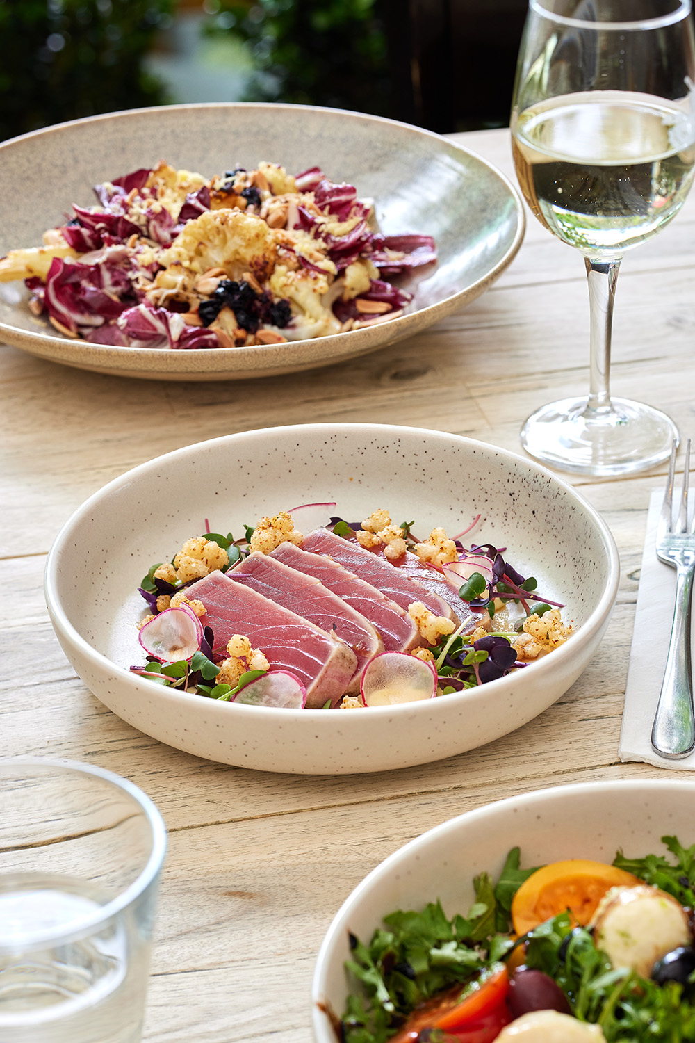 The roast cauliflower and radicchio salad and the cured tuna tataki from The Landing at Riverhead Tavern. Photo / Babiche Martens