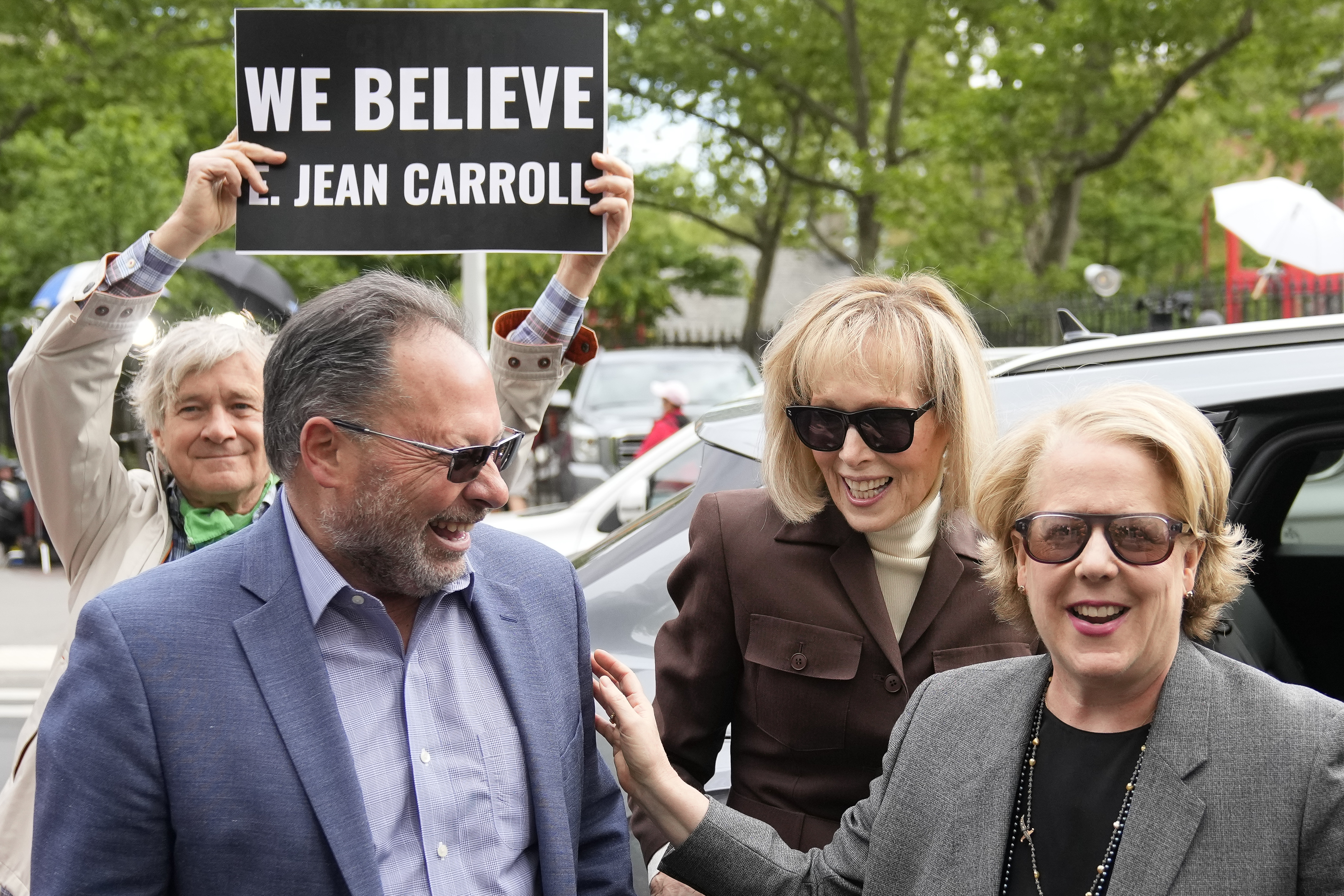 Supporters cheer E. Jean Carroll (second from right), as she arrives at Manhattan federal court. Photo / John Minchillo, AP