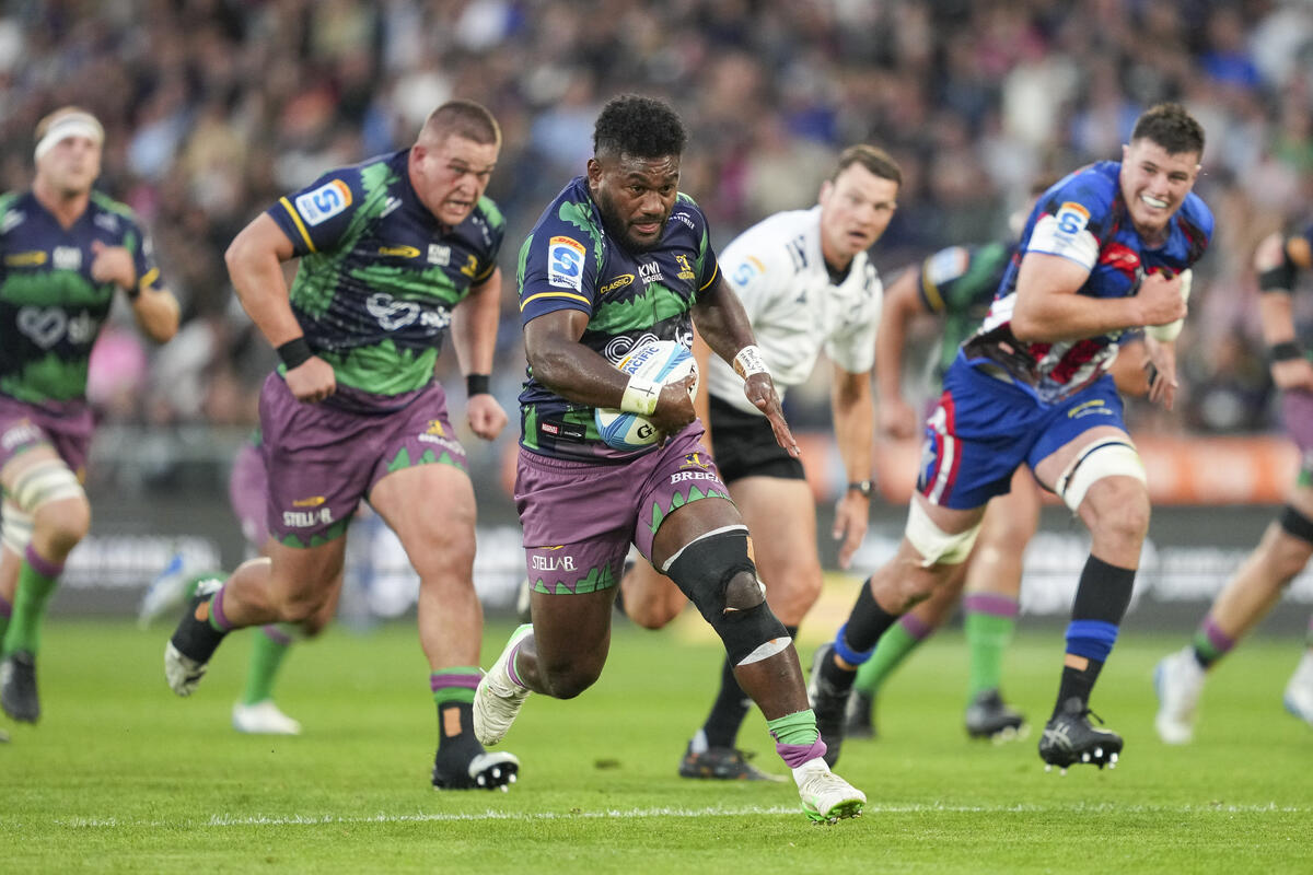 Highlanders midfielder Timoci Tavatavanawai makes a break against the Hurricanes. Photo / Michael Thomas, SmartFrame