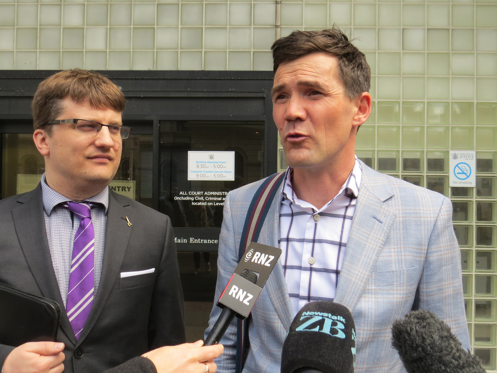 Justin Lester and his legal counsel Graeme Edgeler outside Wellington District Court after applying for a vote recount. Photo / Emme McKay. 