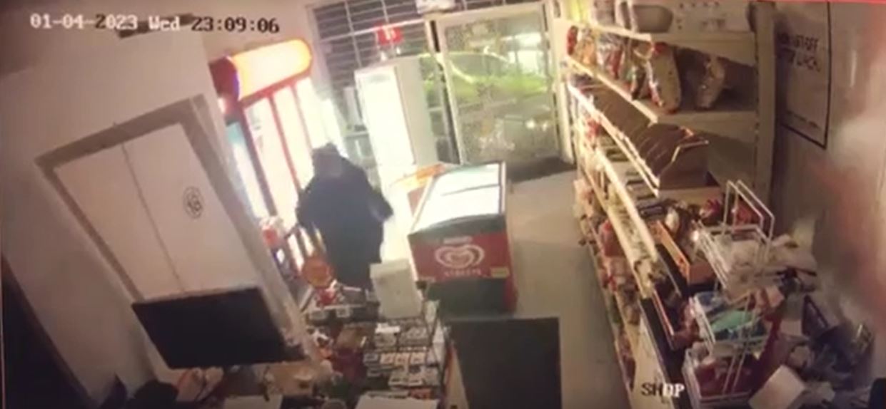 A masked thief enters GAS station on Kaurilands Rd getting away with stolen products. Photo / Supplied