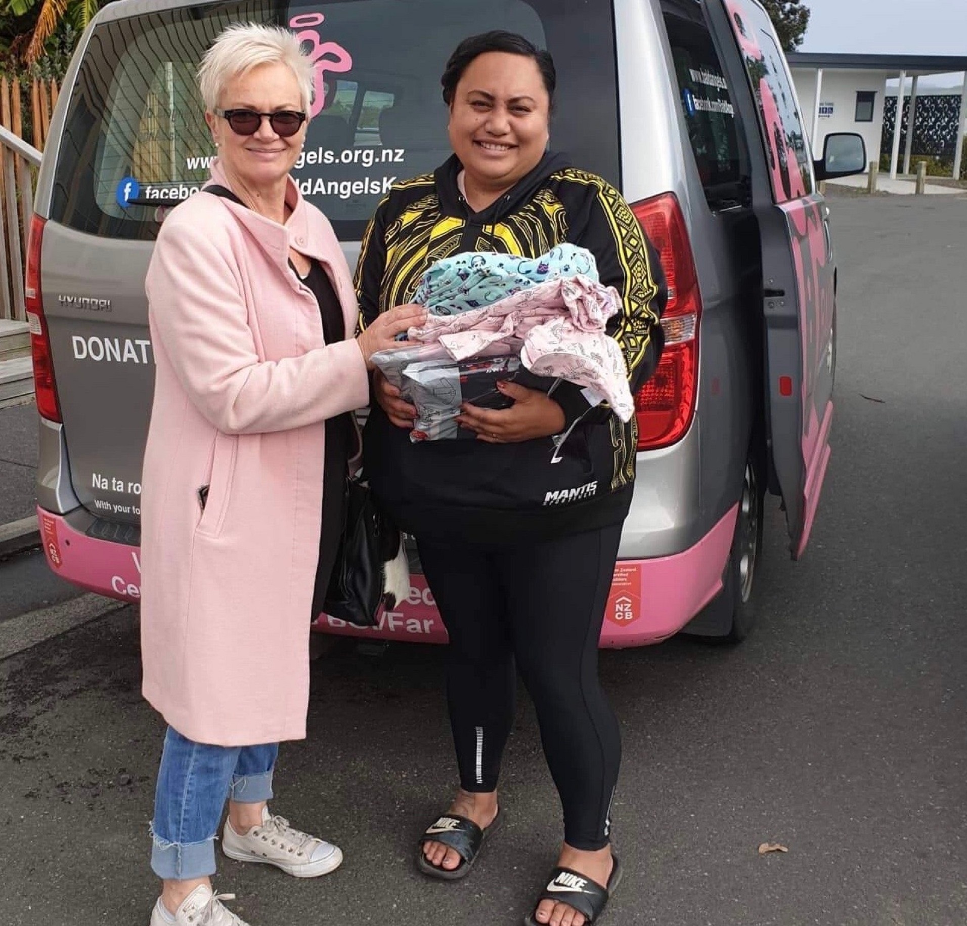 Therese Wickbom with Motuti community leader Emma Marie Davis, who helps distribute bikes, clothes and warm bedding to those in need in the Hokianga. Photo / Jenny Ling 
