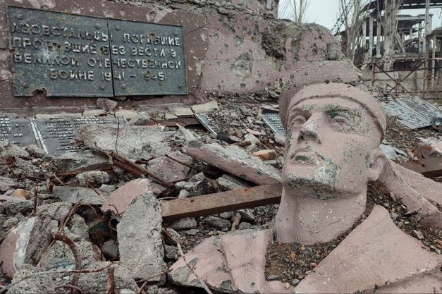 The remains of a statue and other rubble lie in front of the Azovstal steel mill, which was the last place in the Ukrainian city of Mariupol to fall to Russian forces in late May 2022. A Russian master plan for the city envisions restoring the destroyed factory as an industrial park. Photo / AP