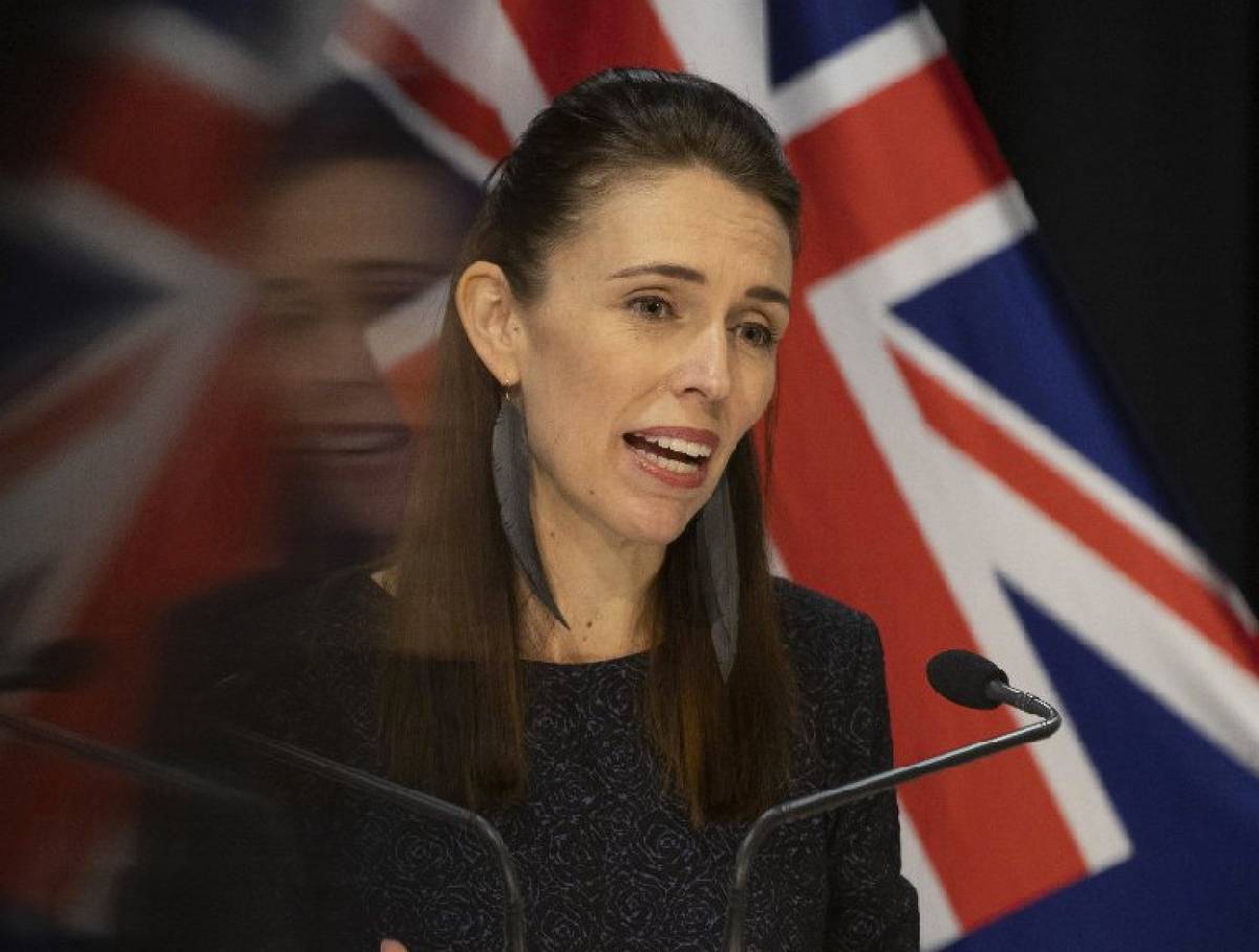 Prime Minister Jacinda Ardern's symbolic support of local makers, wearing feather earrings made from up-cylcled bicyle tubes by Ronja Schipper. Photo / Mark Mitchell.