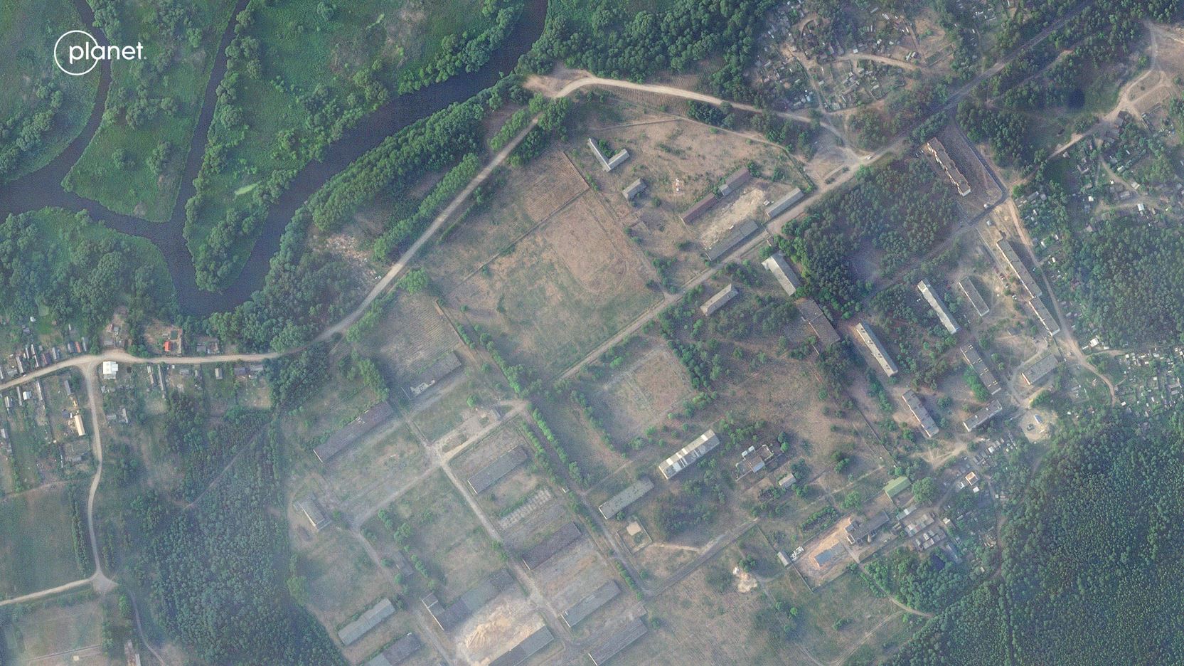 A former military base outside the Belarusian town of Osipovichi shows no signs of the structures that appeared two weeks later. Photo / AP