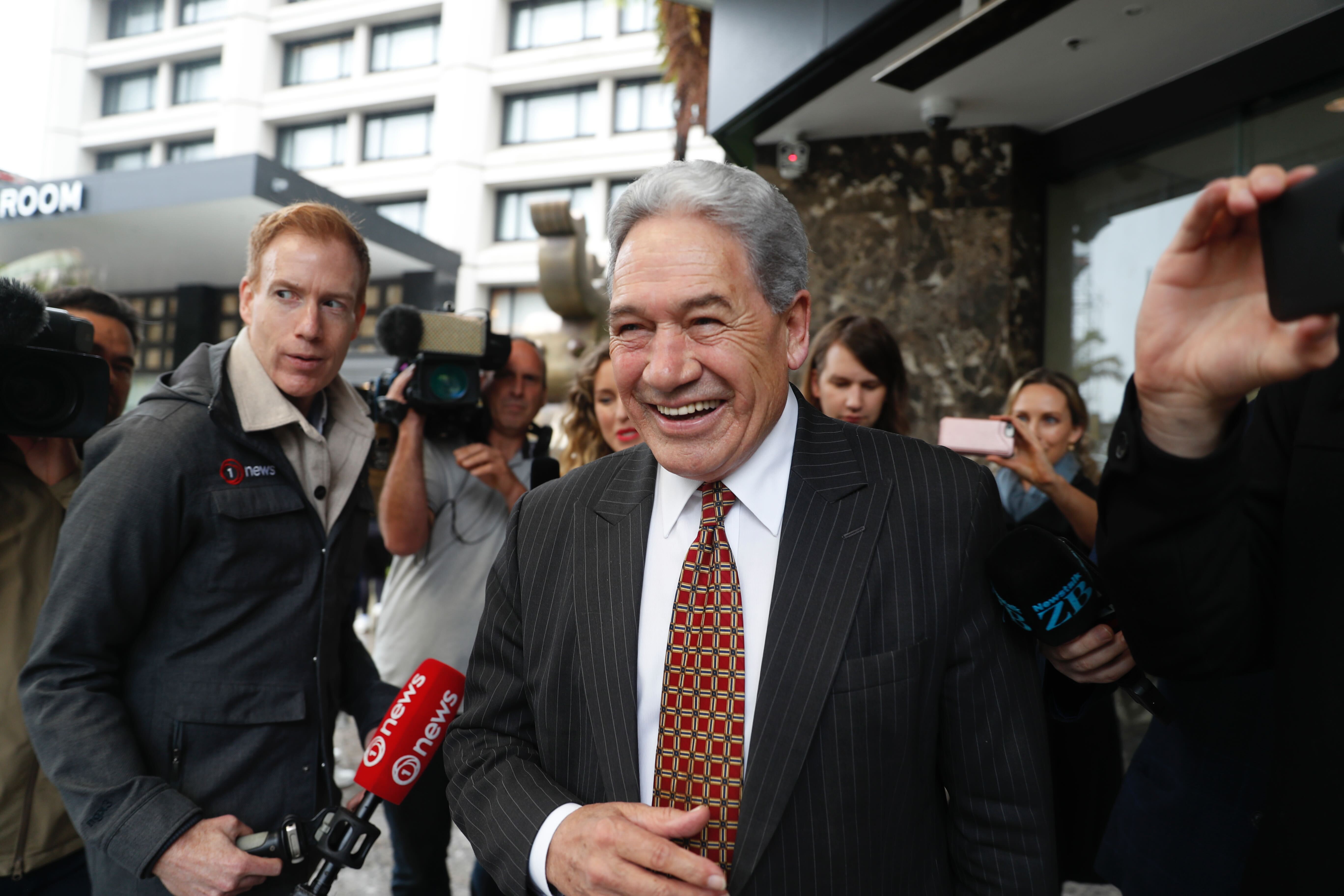 NZ First leader Winston Peters left the Cordis Hotel at lunchtime, but said that he will be back for further talks this afternoon. Photo / Dean Purcell