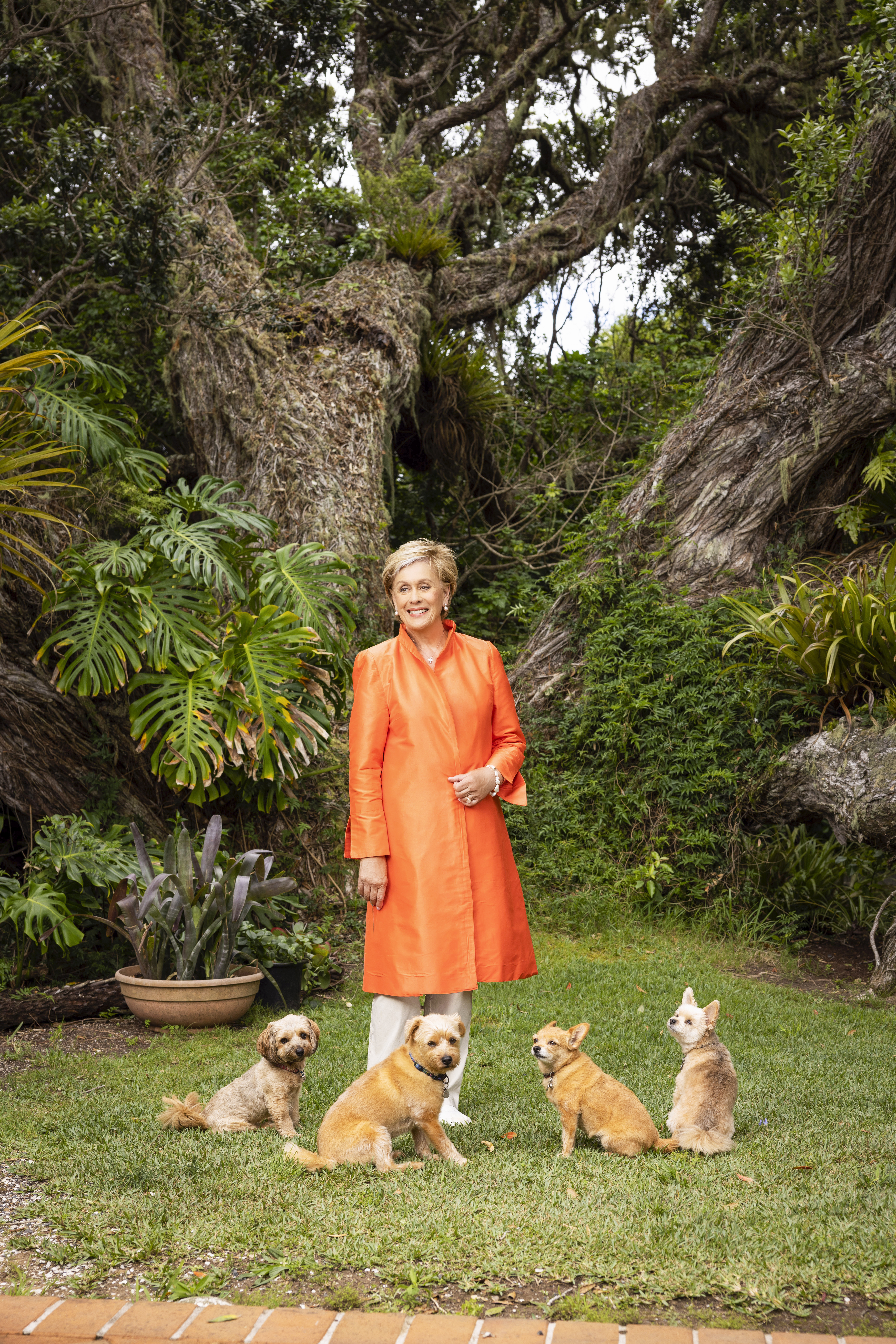Dame Kiri Te Kanawa with her four dogs at her Bay of Islands home. Photo / Jae Frew, New Zealand Woman's Weekly  