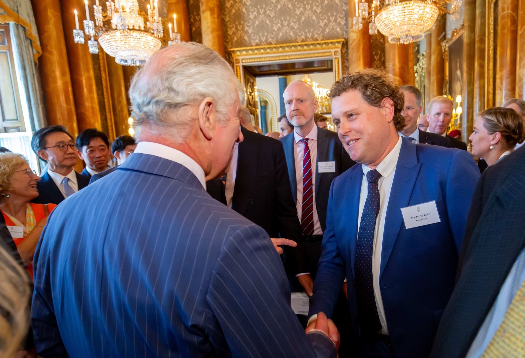 Rocket Lab founder Peter Beck (right) met King Charles III last year and has now been knighted in the King's Birthday honours.