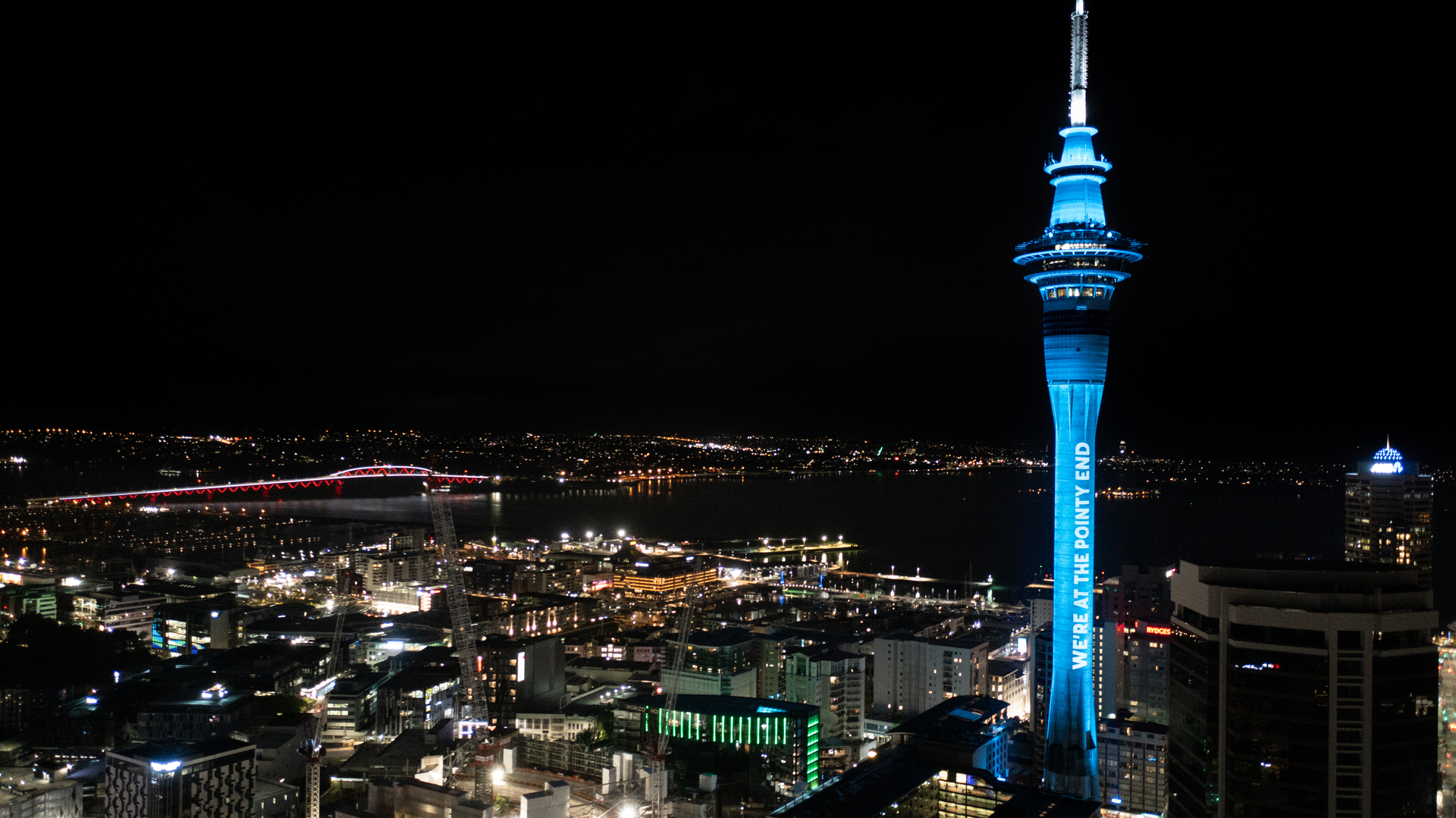 Special messaging projected up the shaft of the Sky Tower to celebrate the double jab rate hitting 80 per cent in November. Photo / Chris Tarpey