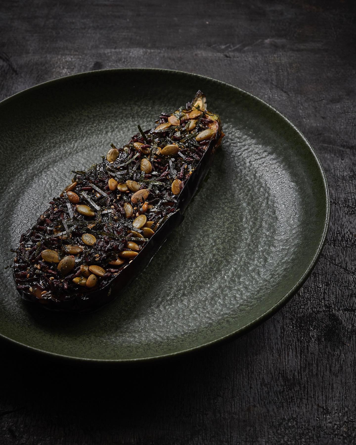 Miso dengaku eggplant with pepitas, puffed grains and nori at Koji. Photo / @Koji.restaurant