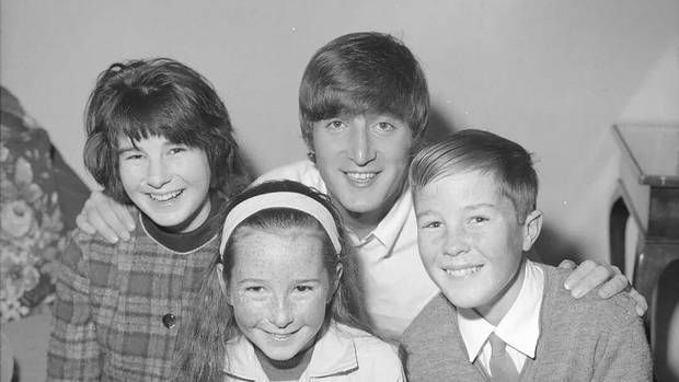 John Lennon with Kiwi relatives (from left) Sue, Helen and Mark Parker, of Levin, during the Beatles 1964 New Zealand tour. Photo / Alexander Turnbull Library