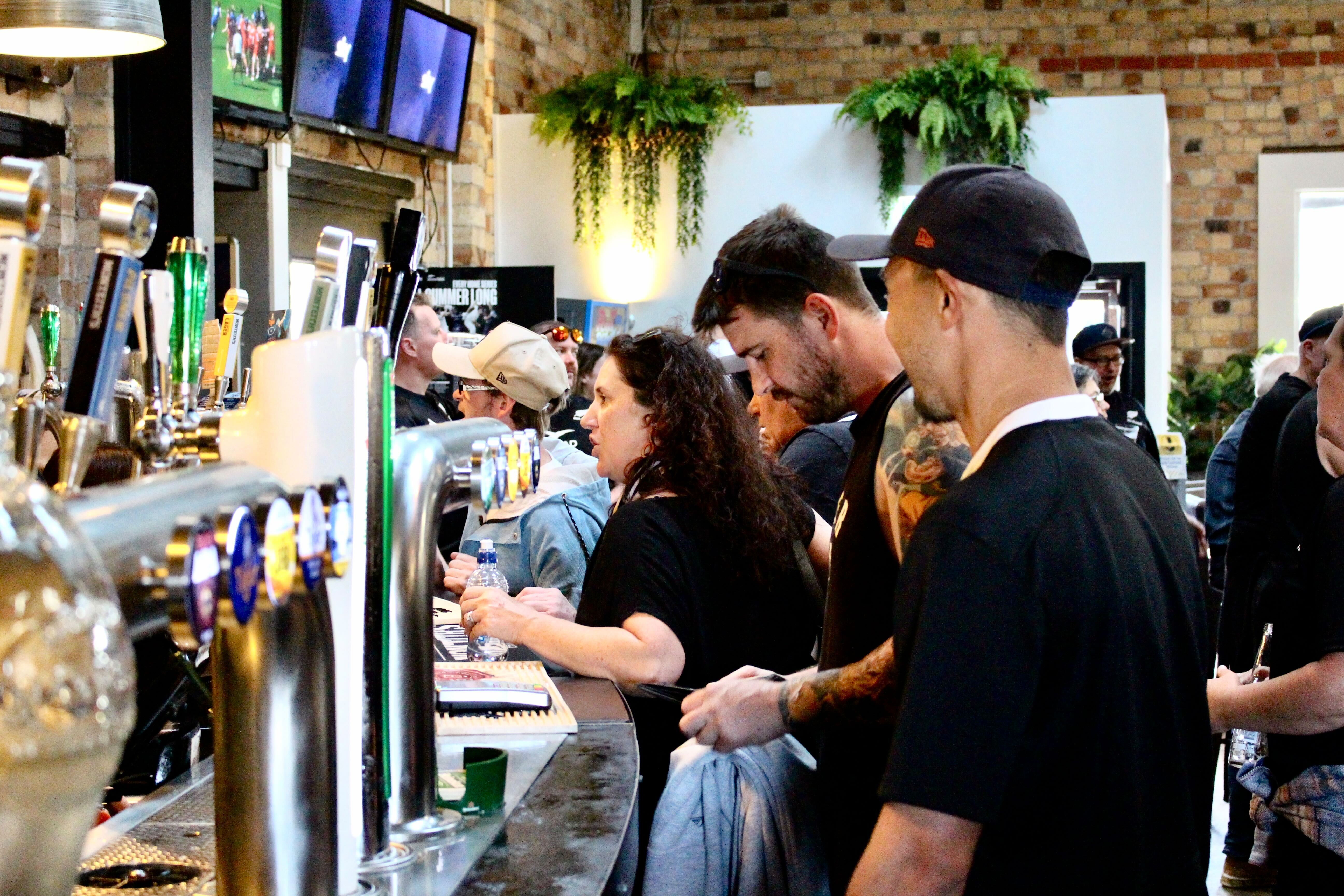 Rugby fans at the Kingslander bar. Photo / Jed Bradley