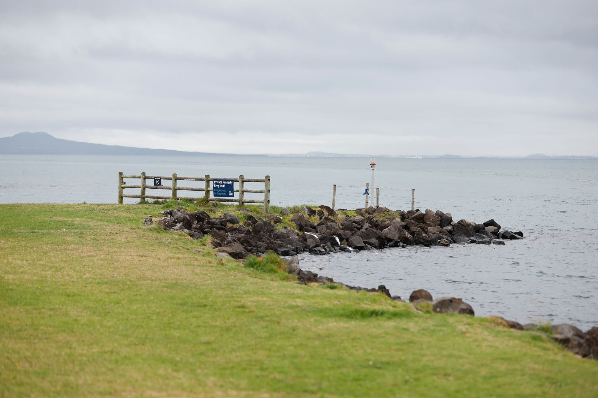 The body of Shulai Wang, 70, was found by a fisherman on the rocks near Auckland's Gulf Harbour Marina. Photo / Michael Craig