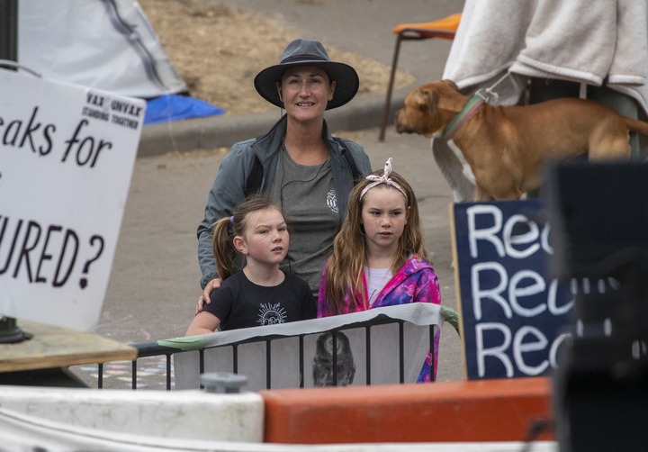 Children are still present despite police urging their parents to take them home. Photo / Mark Mitchell
