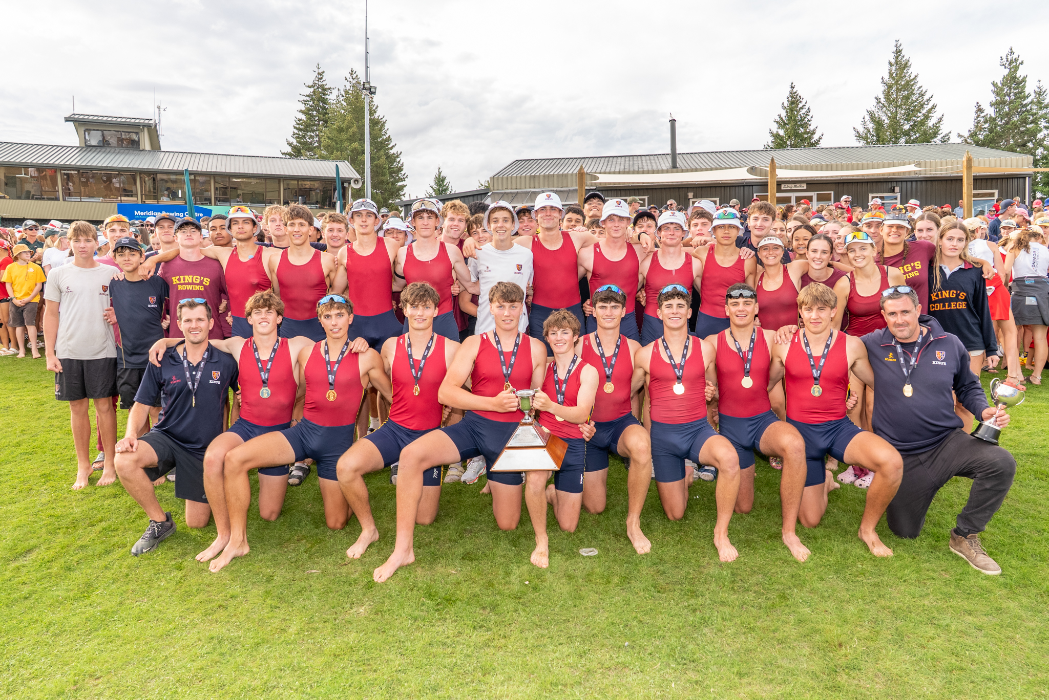 The Bucket Hat brigade - King's College crews celebrate as 2026 Maadi Cup Champions at Lake Ruataniwha, Twizel. Photo / Conrad Blind - Picture Show Ltd