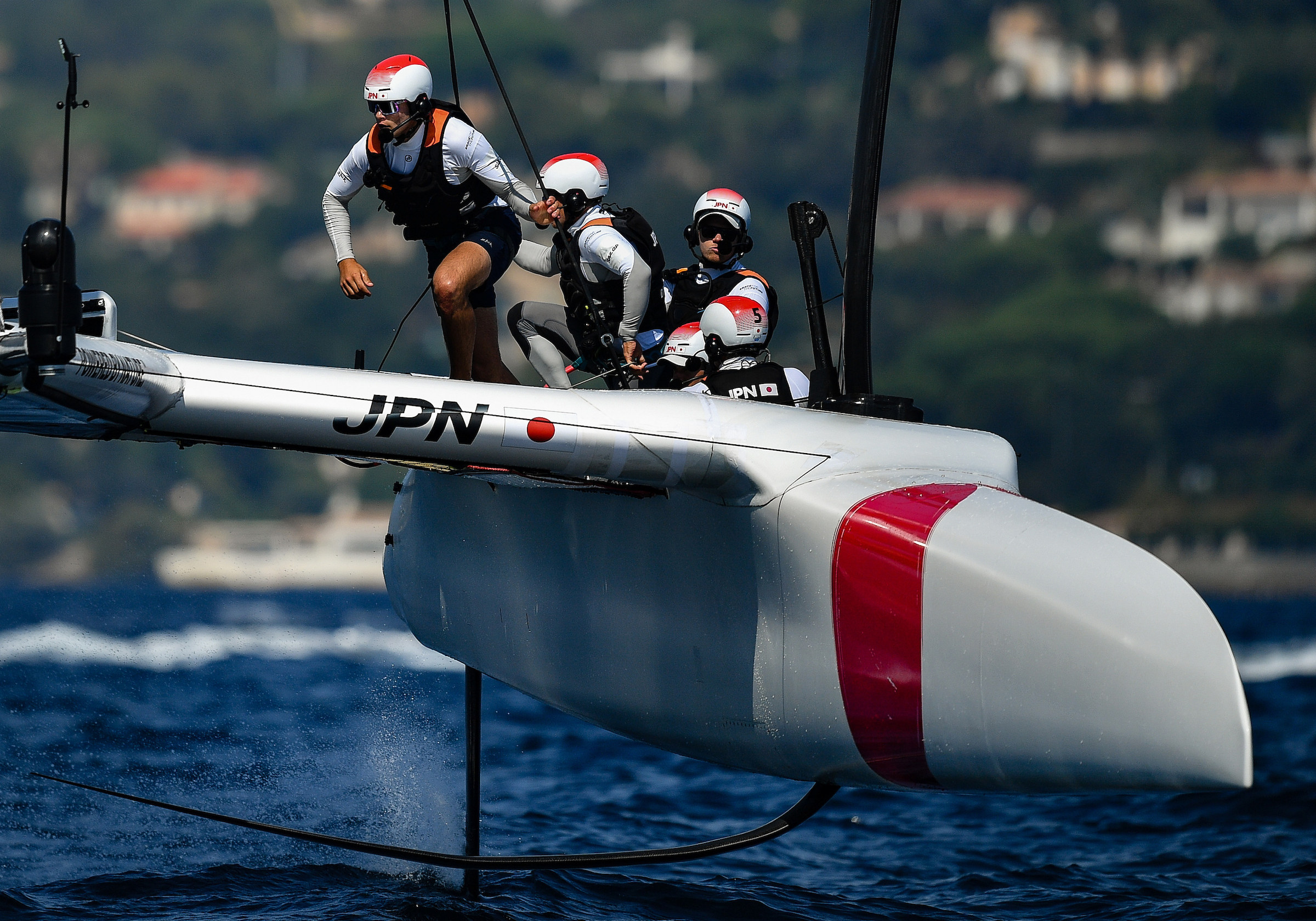 Leo Takahashi, flight controller of Japan SailGP Team, runs across the F50 during practice ahead of racing on Race Day 2. France SailGP, Event 5, Season 2 in Saint-Tropez, France. 12 September 2021. Photo: Ricardo Pinto for SailGP. Handout image supplied by SailGP