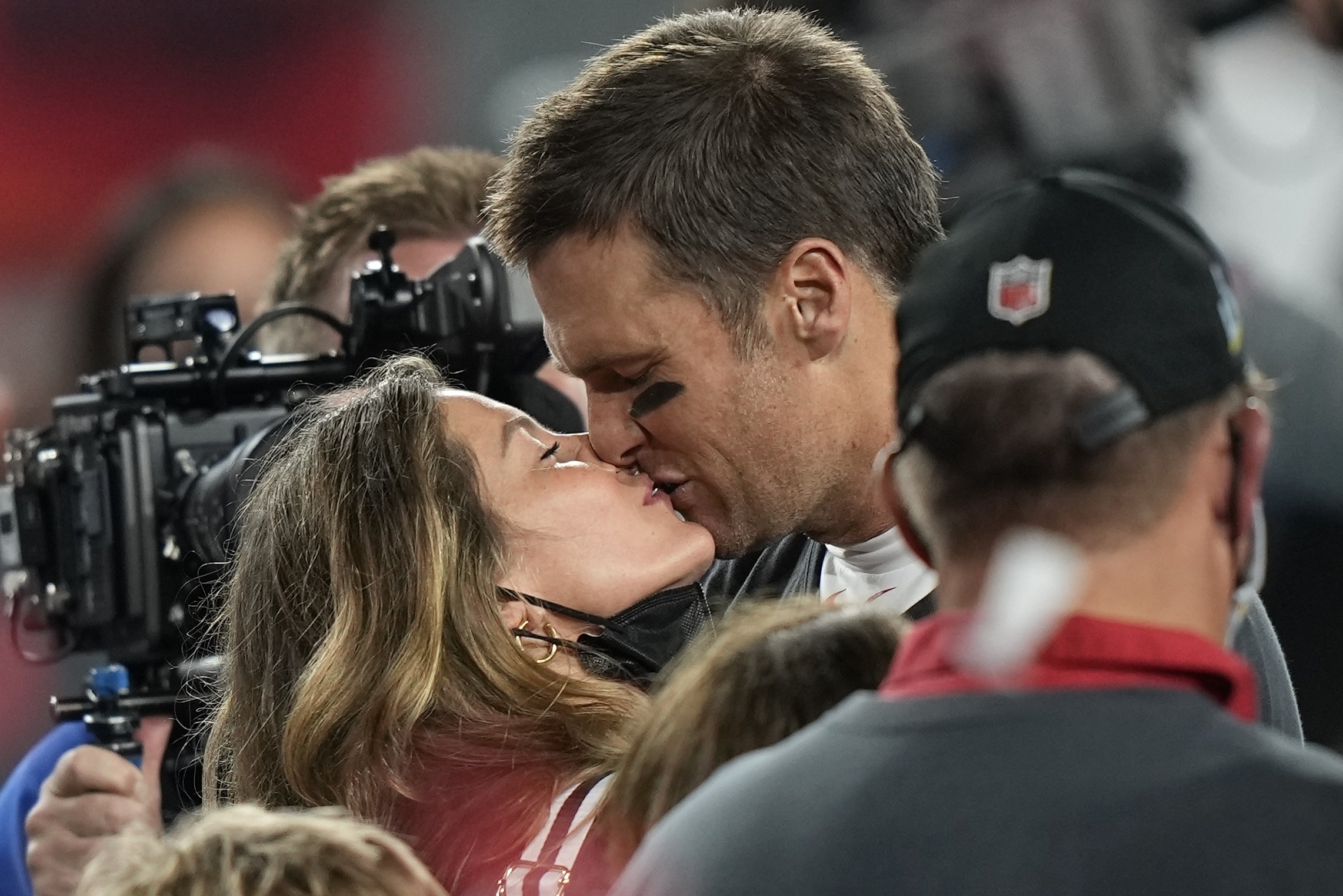 Tom Brady kisses Gisele Bundchen after defeating the Kansas City Chiefs in the 2021 NFL Super Bowl. Photo / AP