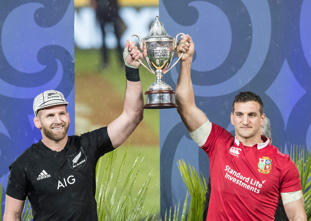 All Black captain and number 8 Kieran Read and Lions Captain/flanker Sam Warburton share the Lions Trophy. Photo / Photosport