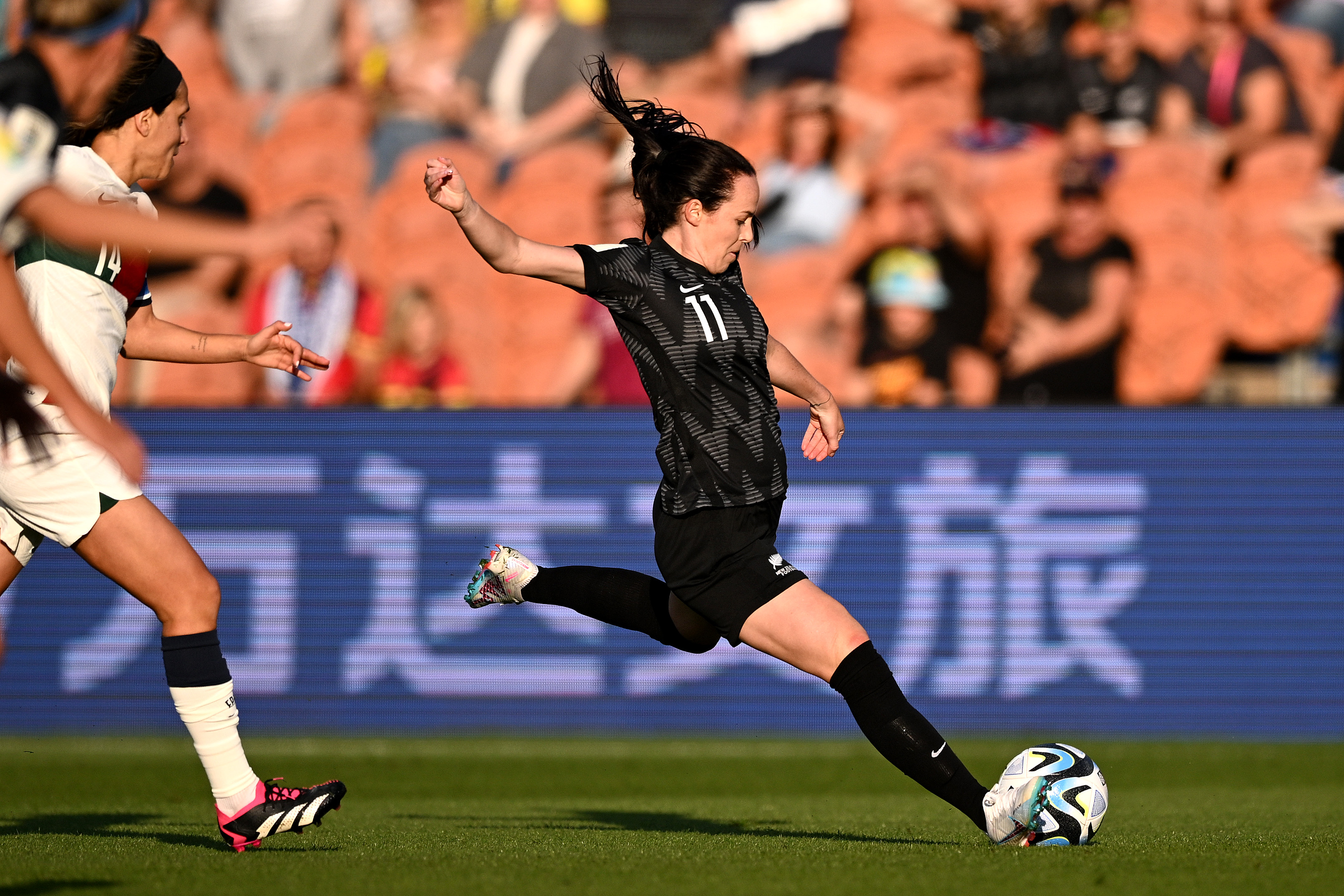 HAMILTON, NEW ZEALAND - FEBRUARY 17: Olivia Chance of New Zealand kicks the ball during the International Friendly match between New Zealand and Portugal as part of the 2023 FIFA World Cup Play Off Tournament at Waikato Stadium on February 17, 2023 in Hamilton, New Zealand. (Photo by Joe Allison - FIFA/FIFA via Getty Images)