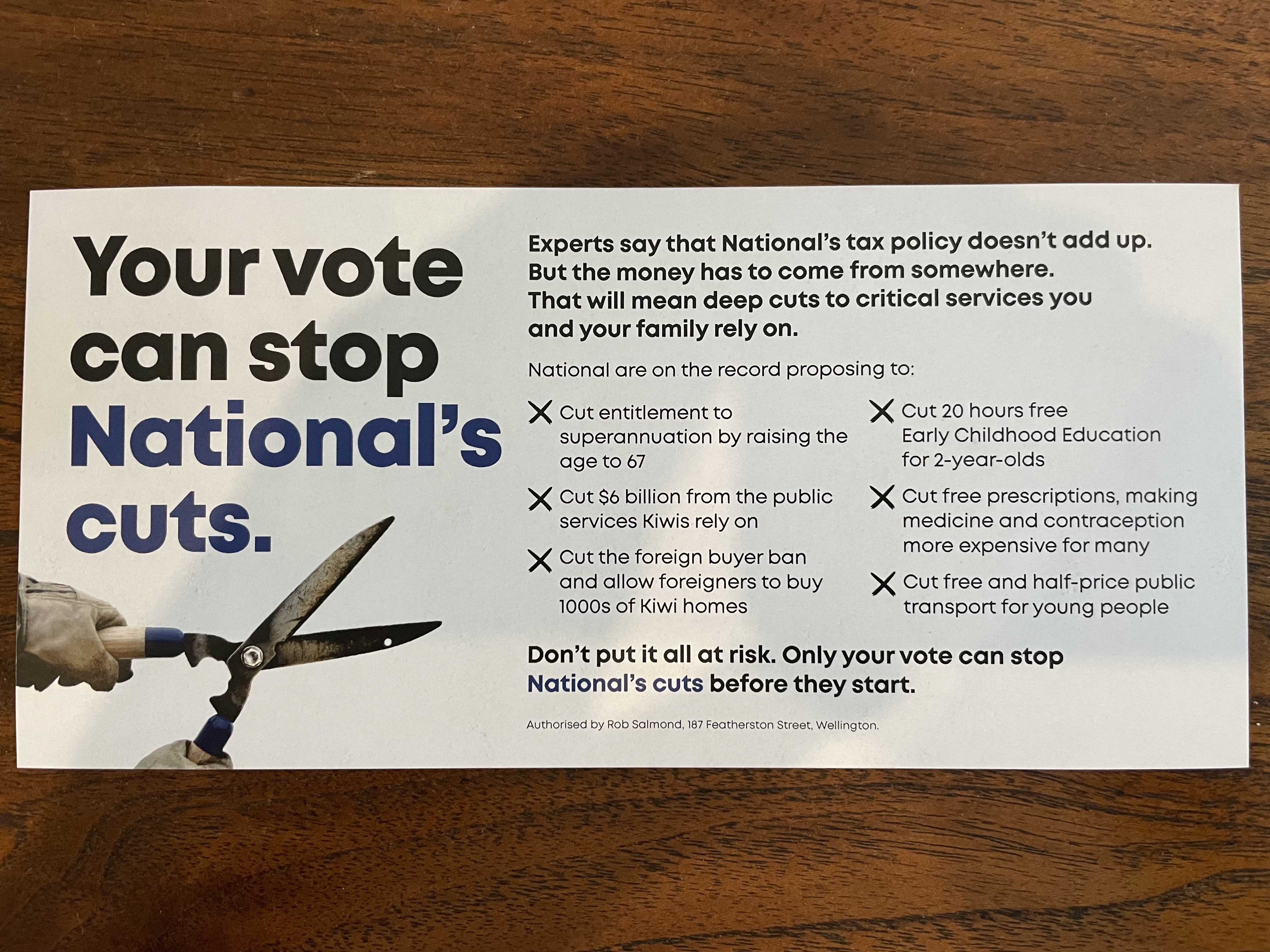 Labour's 2023 election pledge card also hits out at the National Party. Photo / Michael Neilson