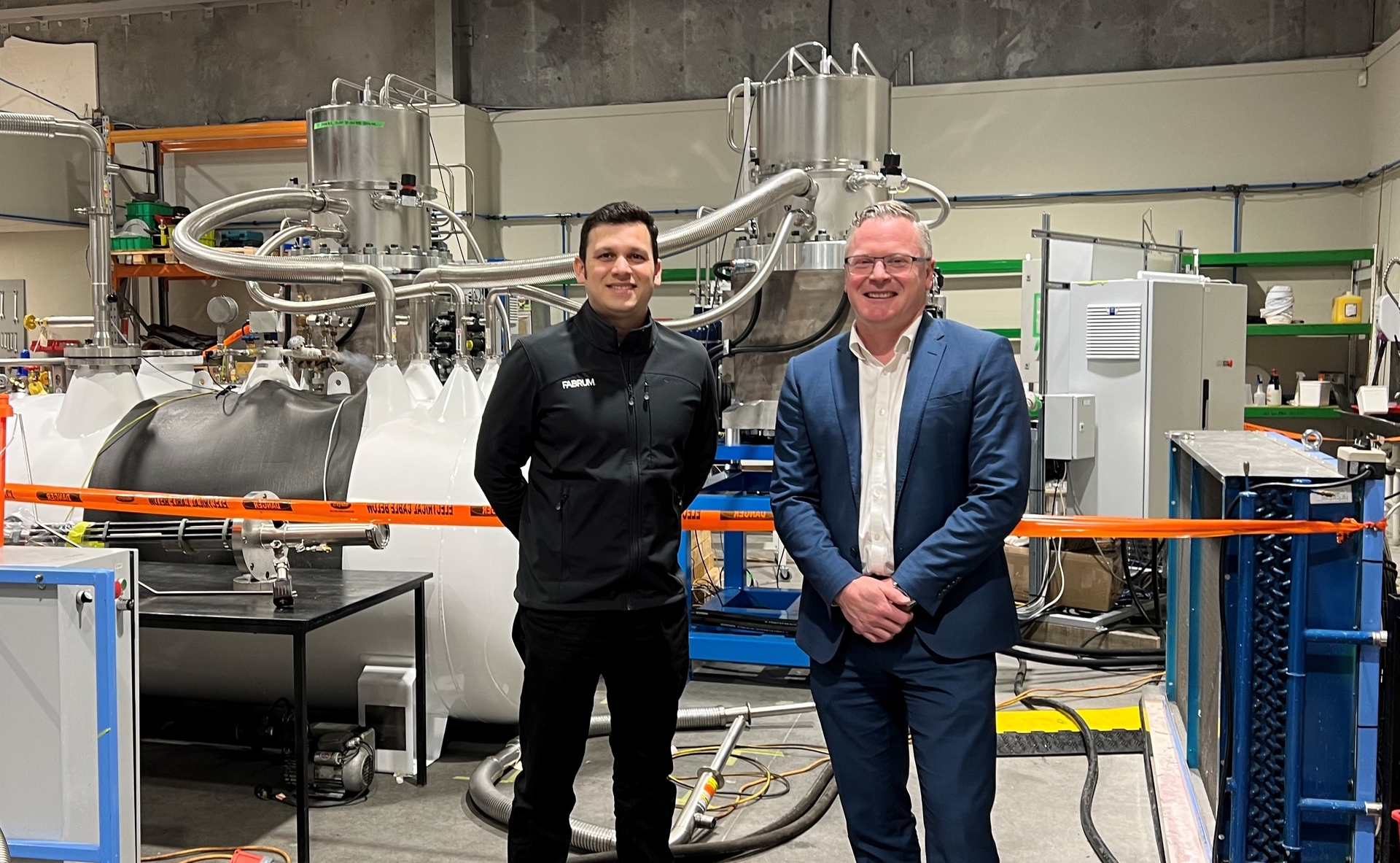 Fabrum CEO Dr Ojas Mahapatra with Jones. Photo / Chris Keall
