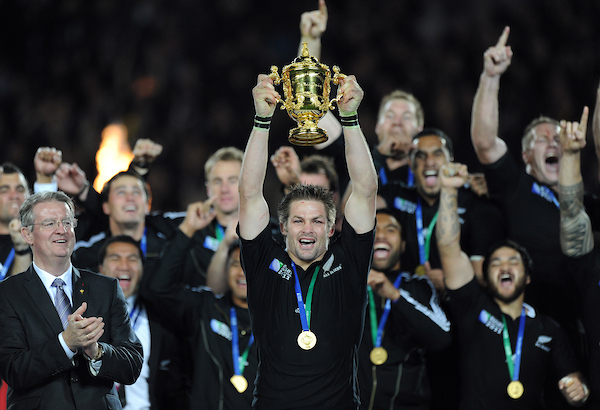 All Blacks captain Richie McCaw celebrates Rugby World Cup victory in 2011 at Eden Park, a campaign that boosted the number of matches the team played in New Zealand. Photo / Photosport