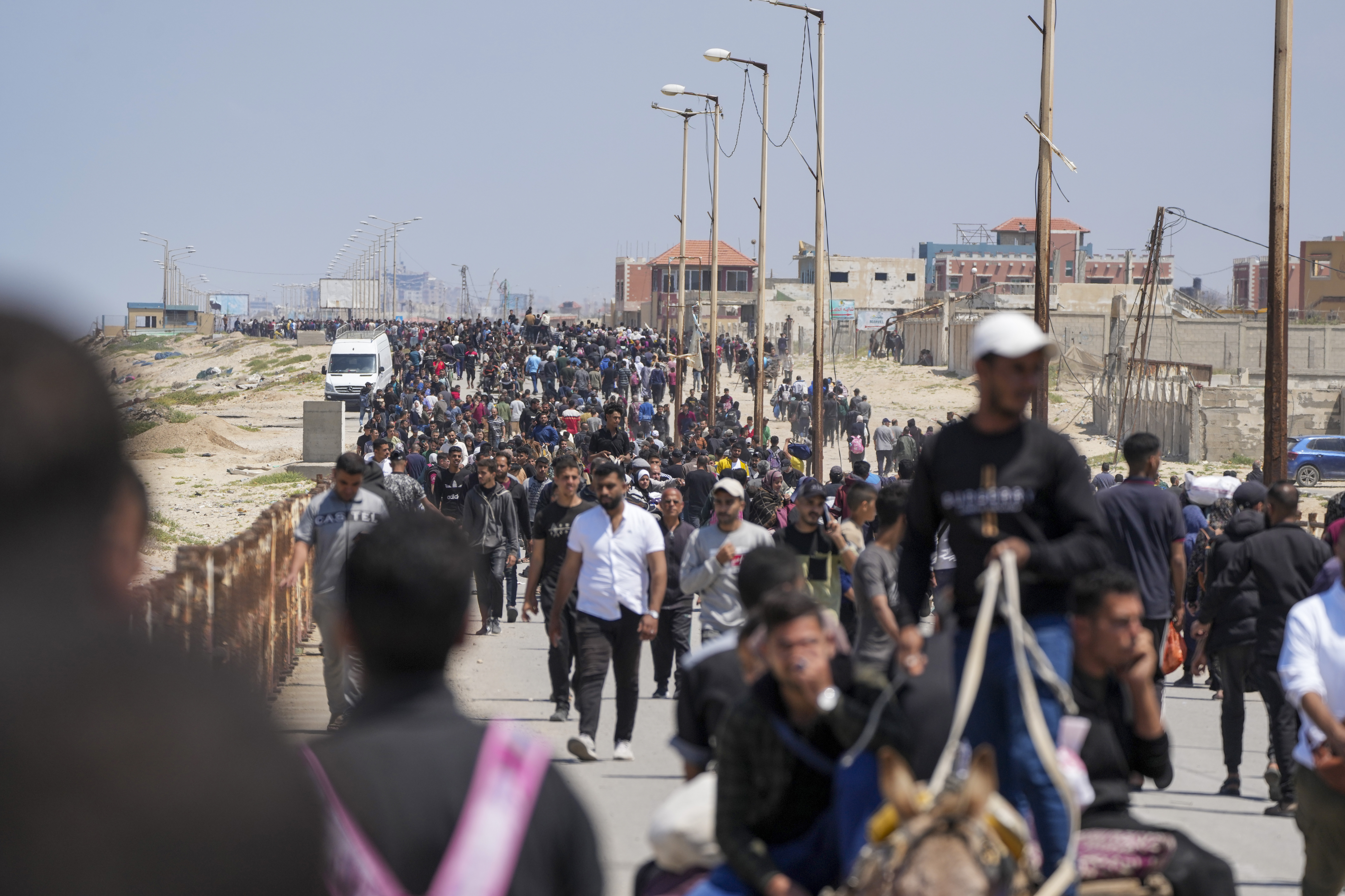 Displaced Palestinians trying to walk back from central Gaza Strip to northern Gaza Strip. As the Israel-Hamas war continues, there are fears it could widen across the region. Photo / AP