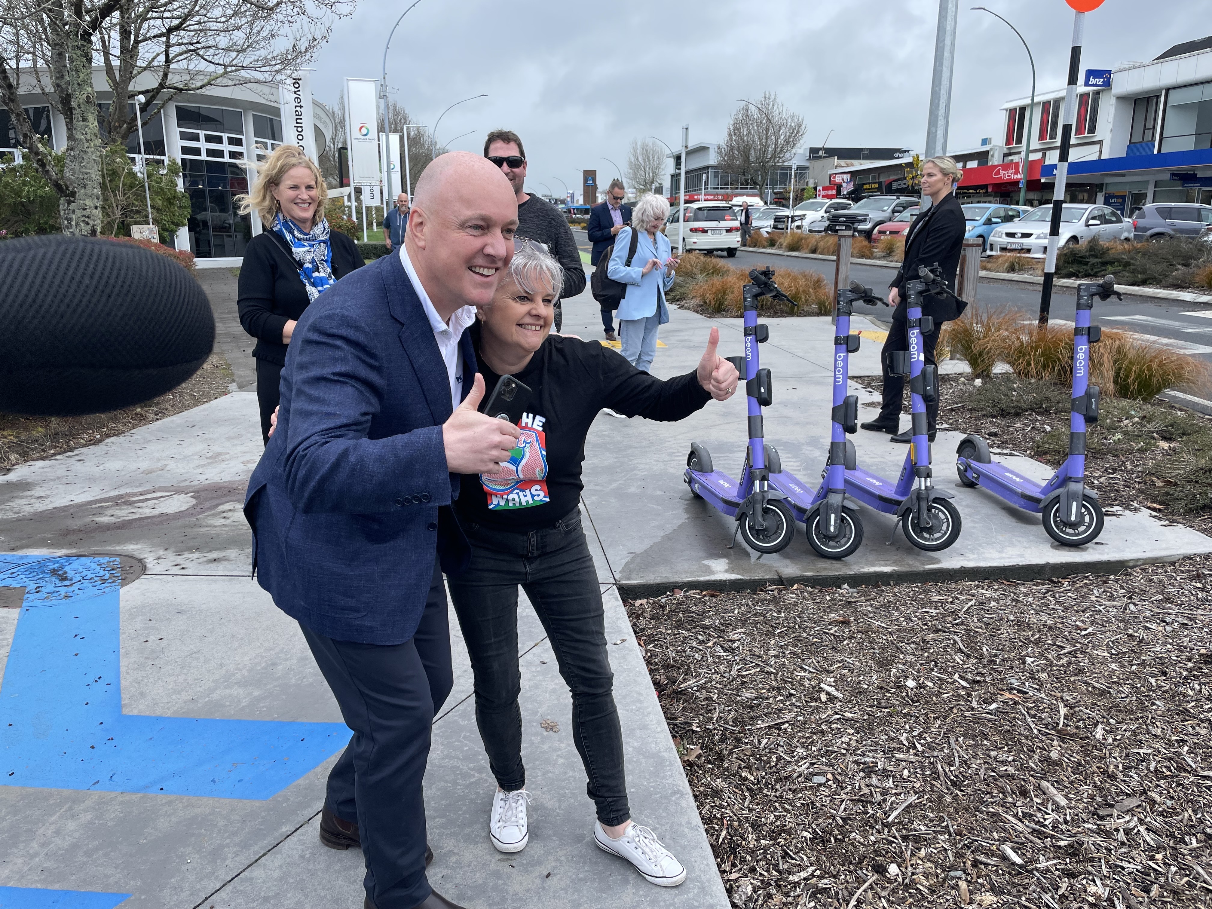 National Party leader Christopher Luxon posing with a Warriors fan in Taupō. Photo / Michael Neilson