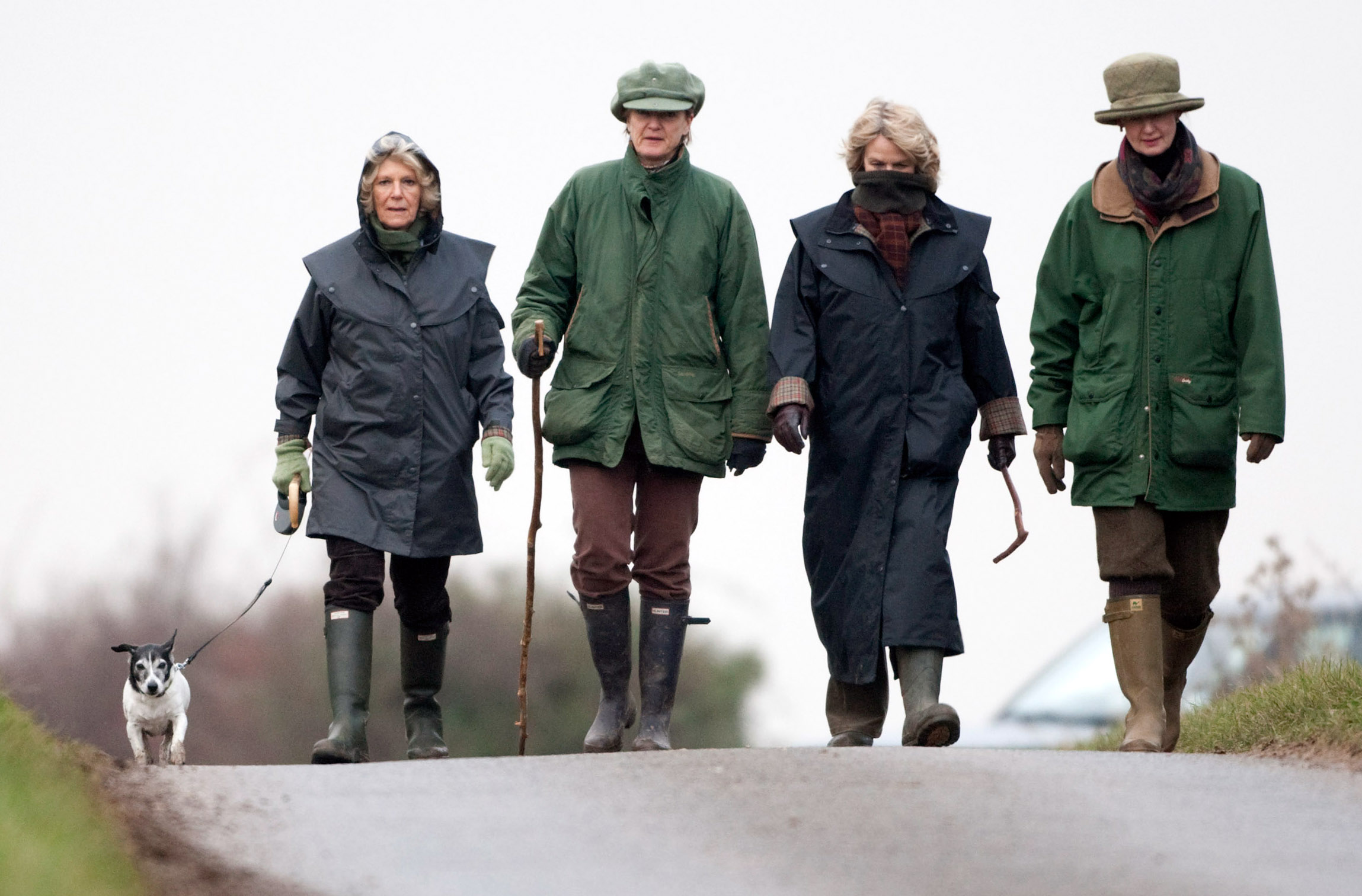 Queen Consort Camilla walks with friends after lunch near Sandringham. Photo / Getty Images