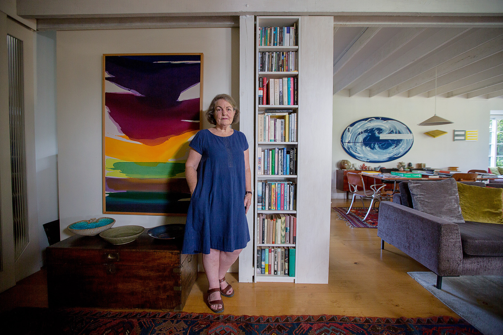 New Zealand artist Gretchen Albrecht with her 1972 painting Purple and Crimson Sky. Photo/Chris Loufte