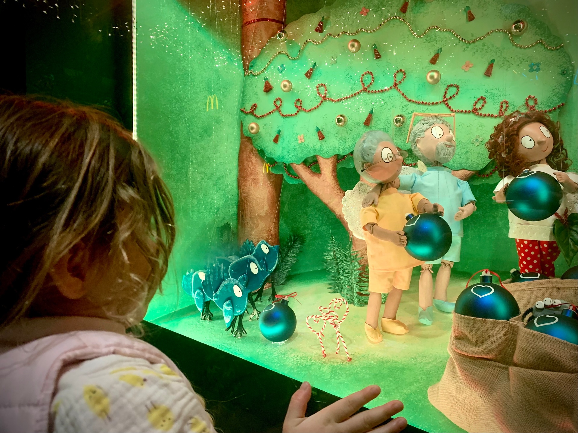 Audiences young and old are captivated by the Christmas window display at Smith & Caughey's on Auckland's Queen Street. New Zealand Herald Photograph by Ella Wilks
