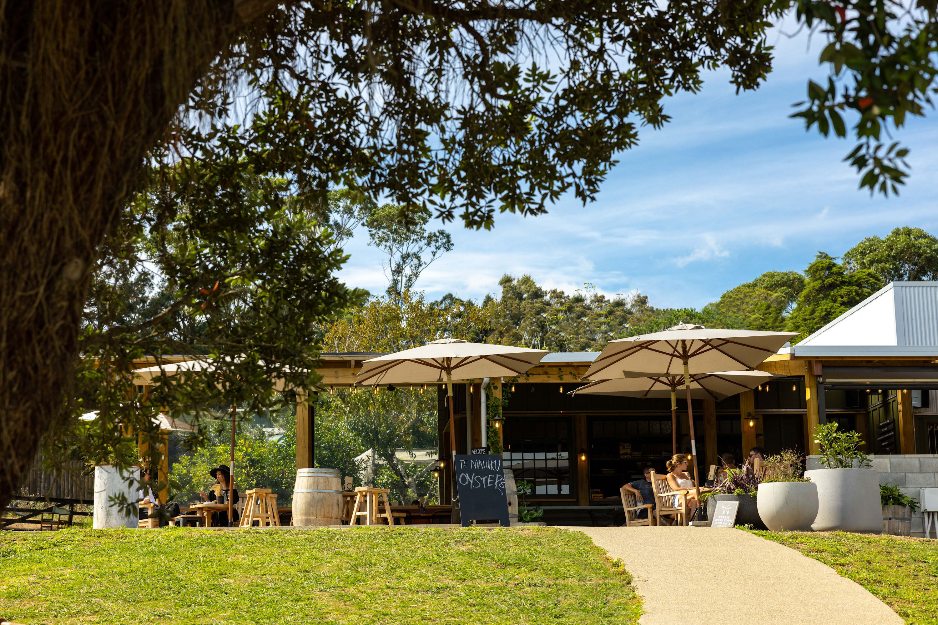 Sunny outdoor tables at The Heke, Waiheke.