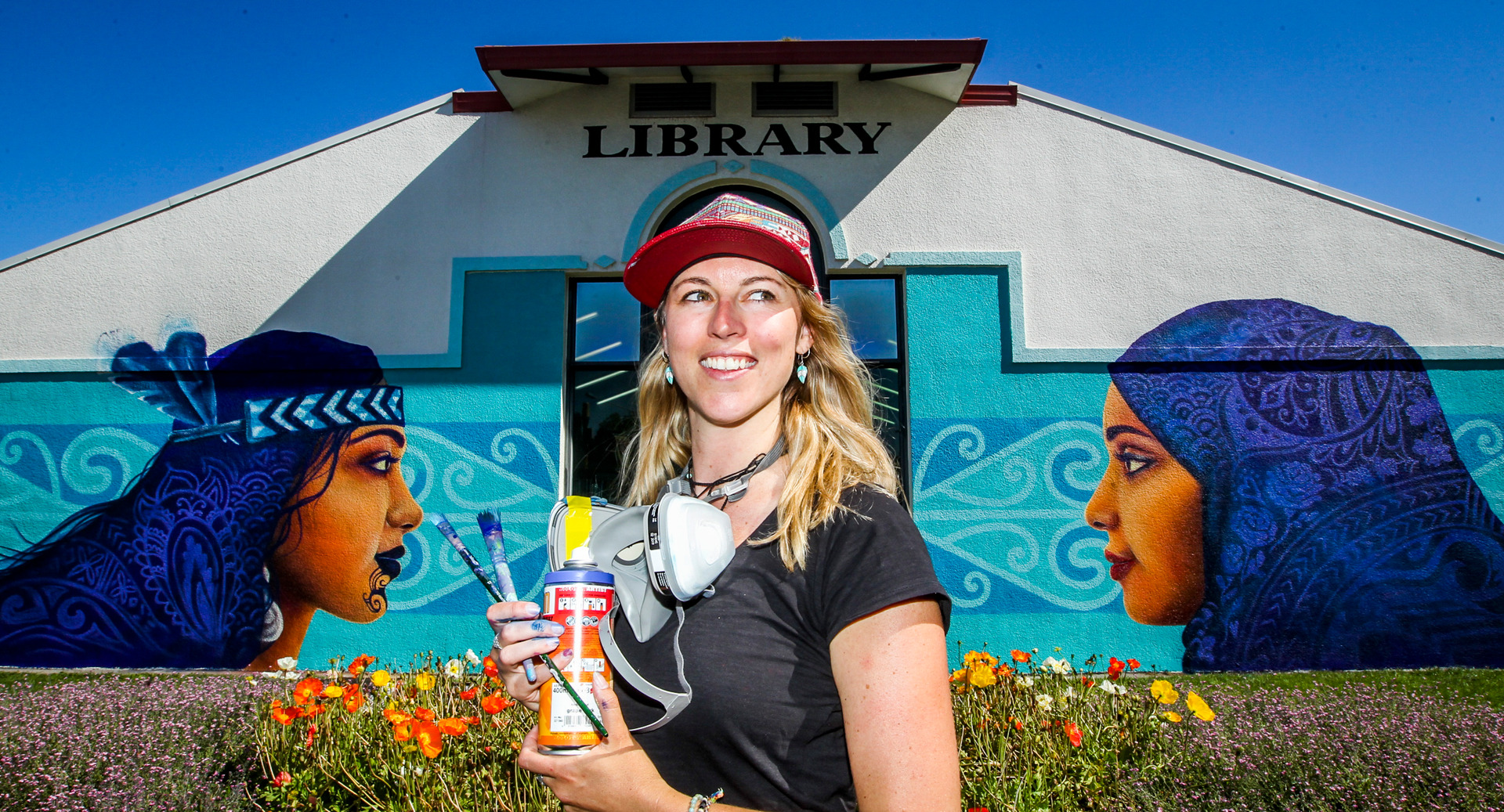 Street artist Erika Pearce has painted a mural on the Hastings Library building. Photo / Paul Taylor