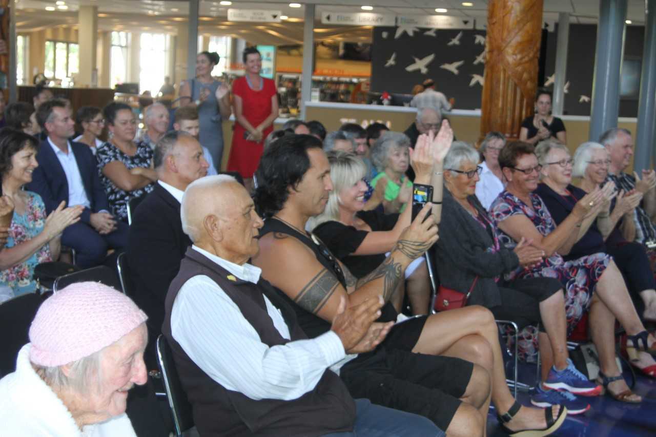 Guests applaud as Kelvin Davis announces funding for Far North initiatives at Te Ahu in Kaitaia. Photo / Peter Jackson
