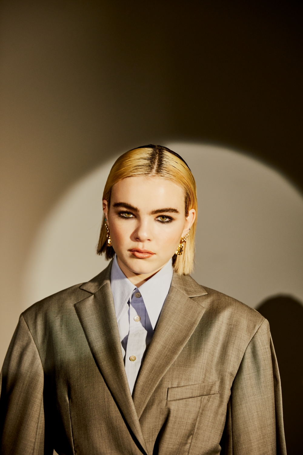 CENTRE STAGE: Acne blazer, $1198, from Workshop. Gucci shirt (POA). Photo / Frances Carter.