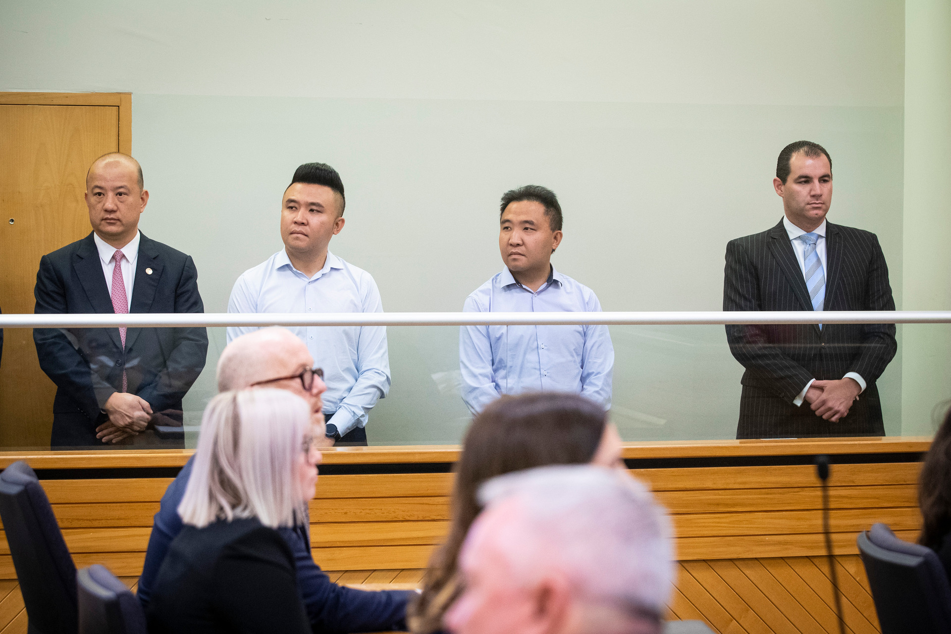 Yikun Zhang, Shijia (Colin) Zheng, Hengjia (Joe) Zheng and Jami-Lee Ross in the Auckland District Court last year. Photo / Jason Oxenham
