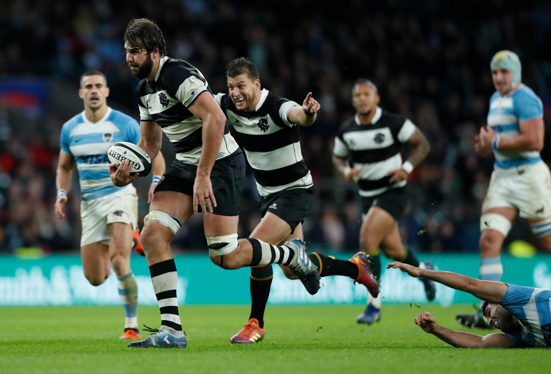 Barbarians's Lood de Jager runs onto score a try during the international Rugby Union match between Argentina and the Barbarian's at Twickenham stadium. Photo / AP