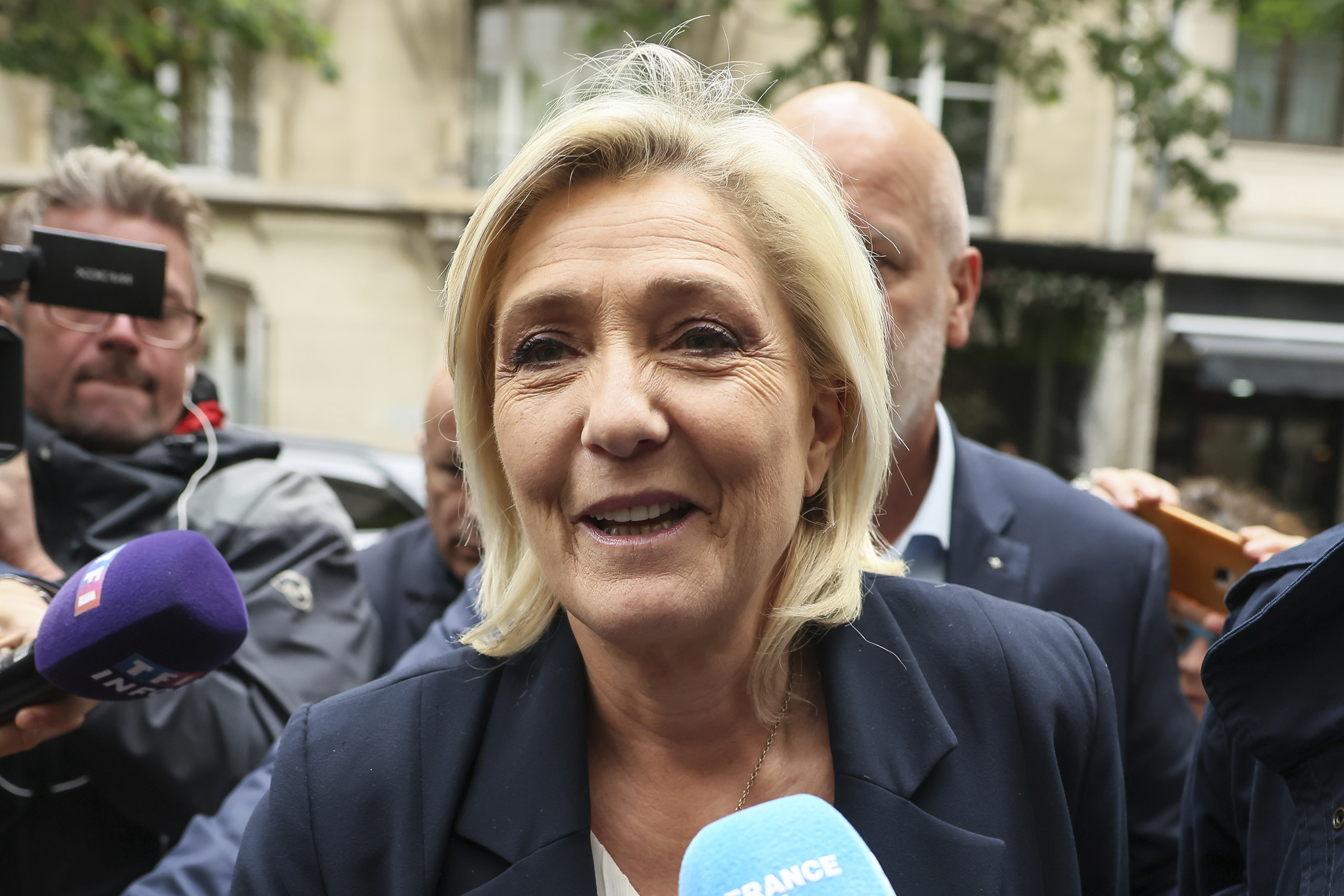 French far-right leader Marine Le Pen arrives at the National Rally party headquarters. Photo / AP