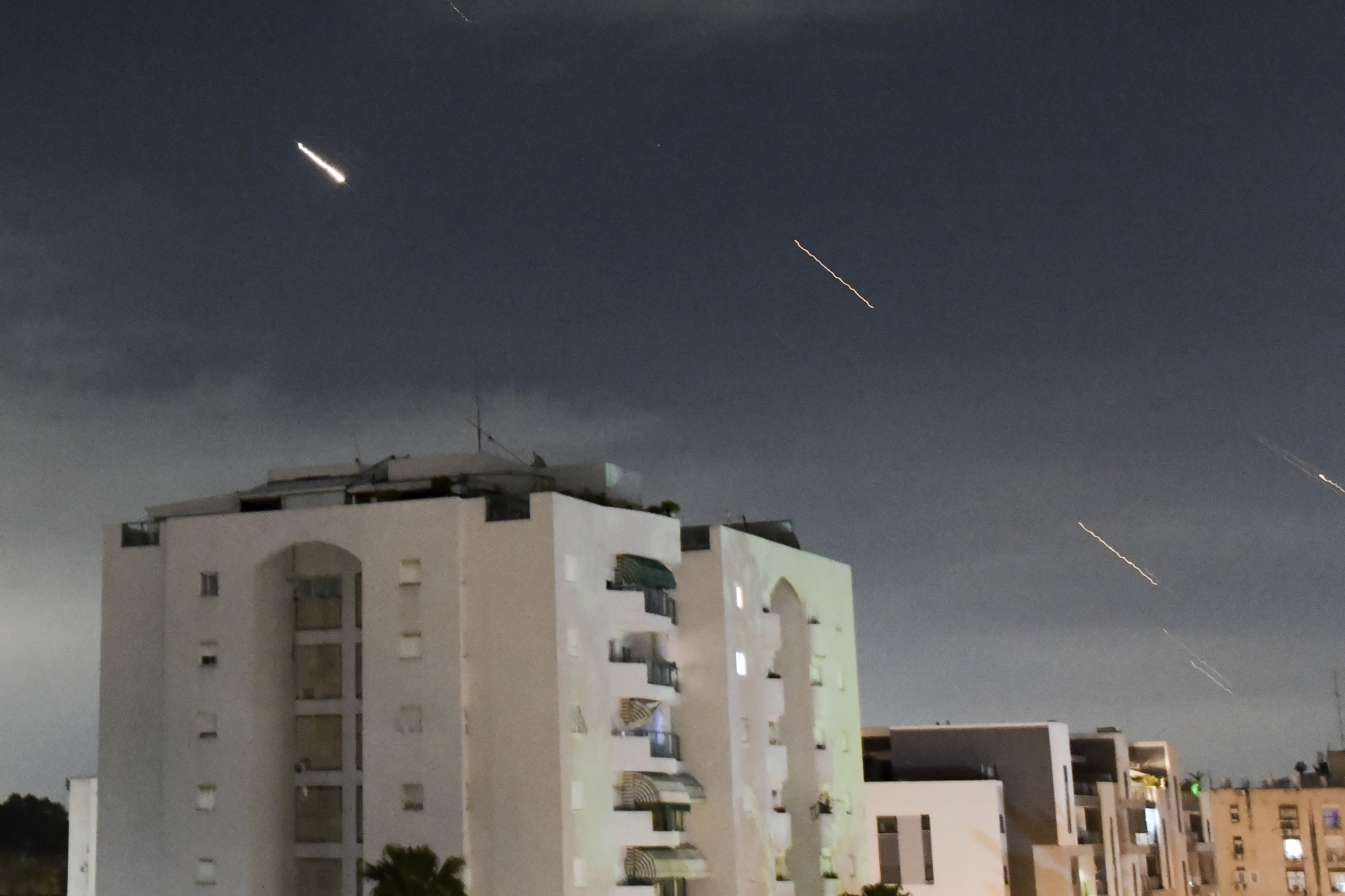 Israeli Iron Dome air defence system launches to intercept missiles fired from Iran, in central Israel. Photo / AP