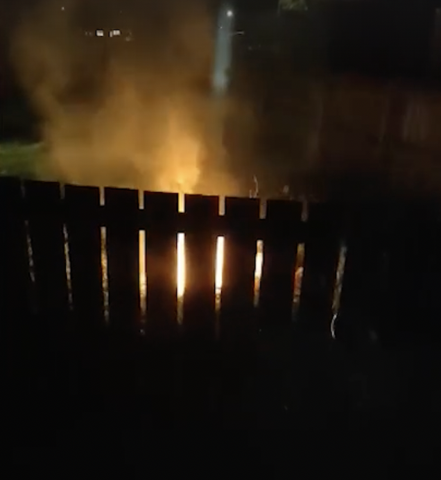 A rubbish fire over the fence. The regular fires blow smoke into neighbouring properties. Photo / Katelyn Park