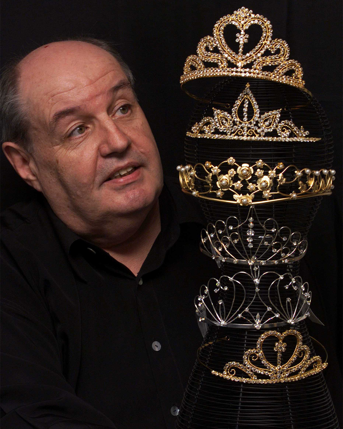 Kevin Berkahn with a series of tiaras, in 1999. Photo / File