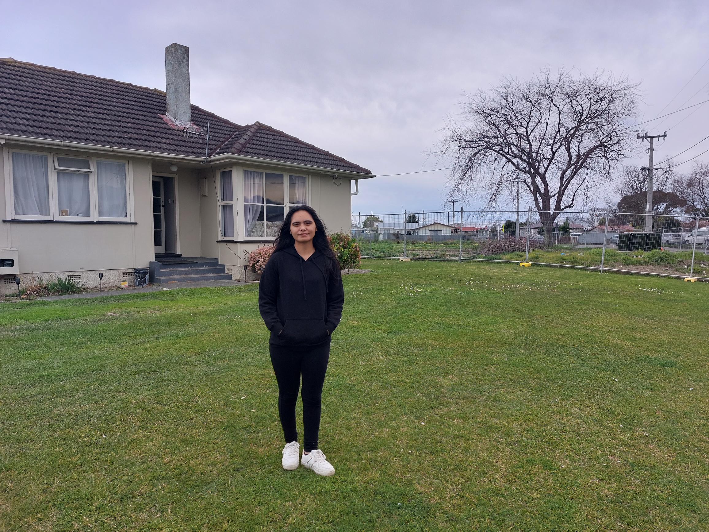 Michelle Courtney once had neighbours. She wants to see housing return to the vacant section surrounding her home. Photo / Gary Hamilton-Irvine