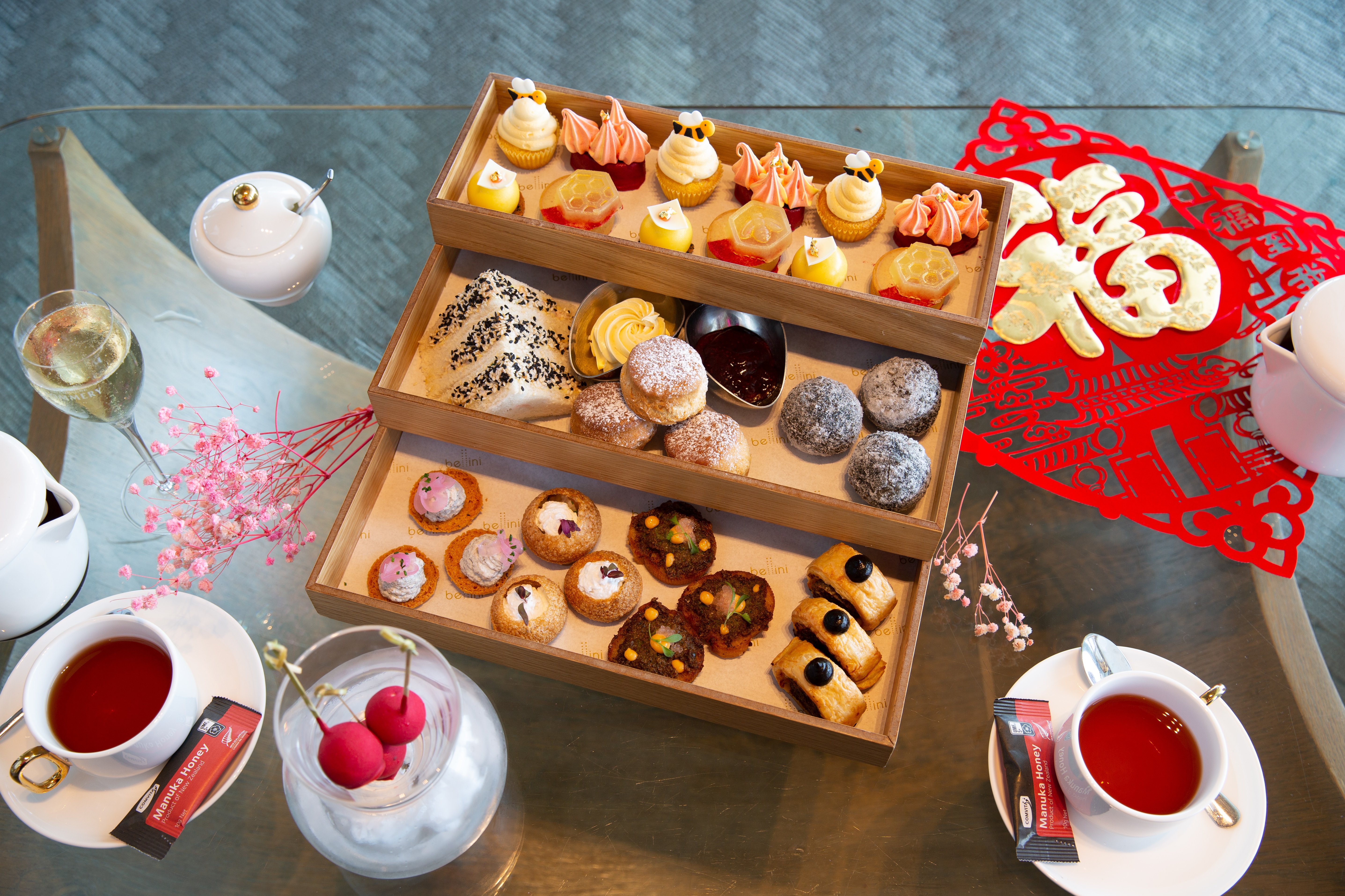 Lunar New Year high tea at the Hilton, Auckland, has orange almond cupcakes, “breath of the dragon” meringues and smoking dragon fruit icecream bonbons, among other treats. Photo / Sylvie Whinray