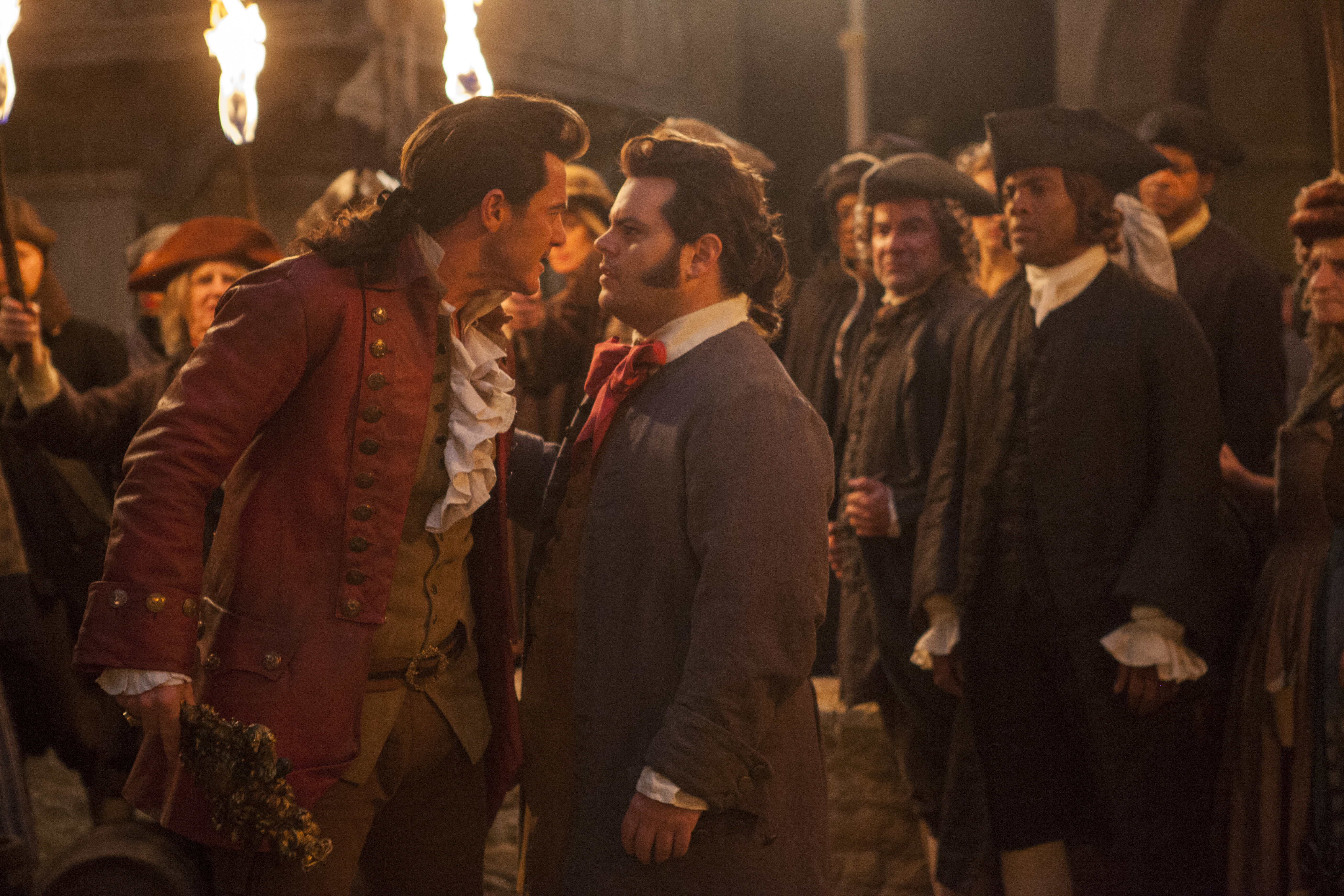 Gaston (Luke Evans) and LeFou (Josh Gad) get up close and personal in Beauty and the Beast. Photo / Supplied