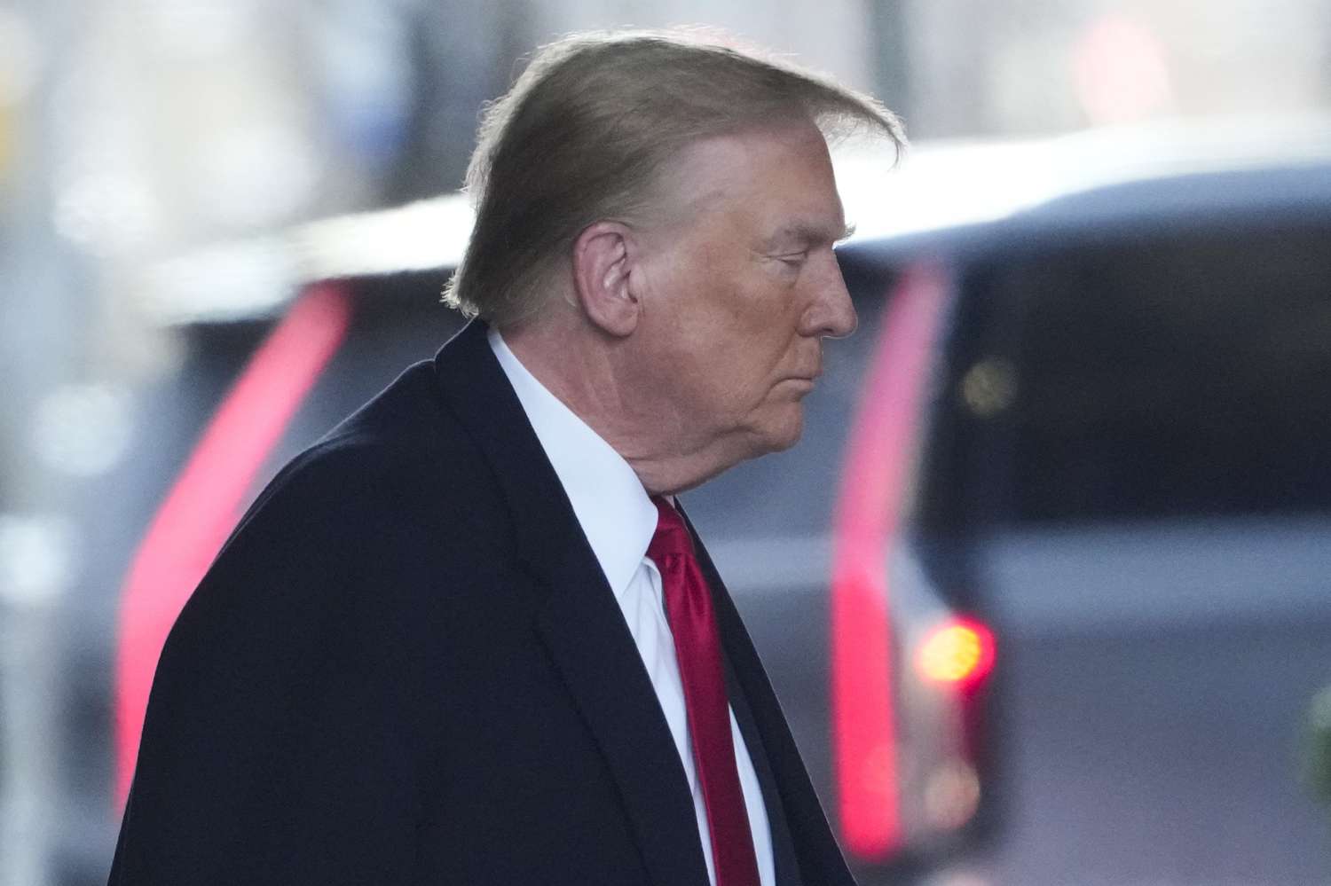 Former US President Donald Trump leaves his apartment building in New York. Photo / AP