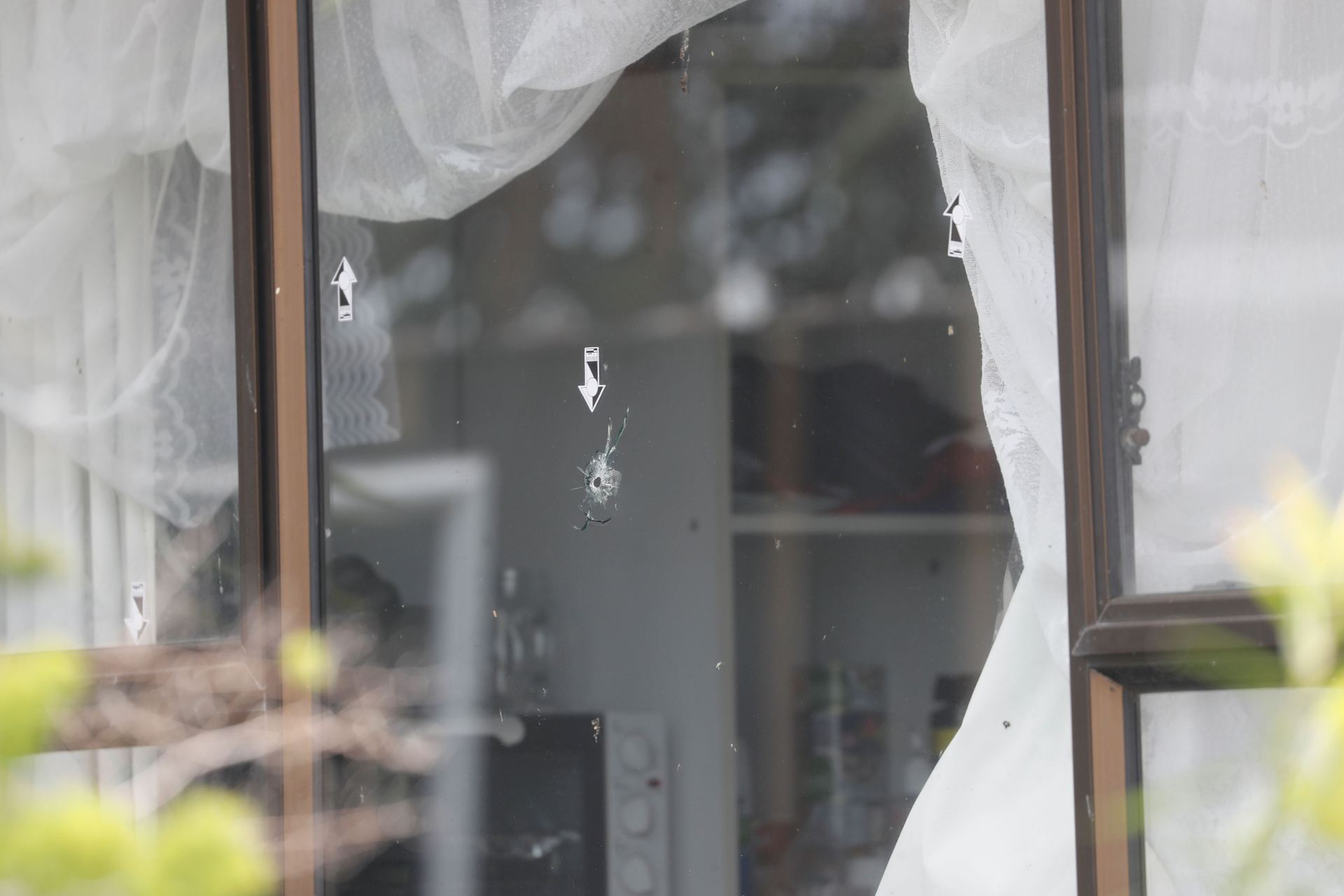 Bullet holes at the scene of the shooting on Gibbs Road, Manurewa. Photo / Dean Purcell