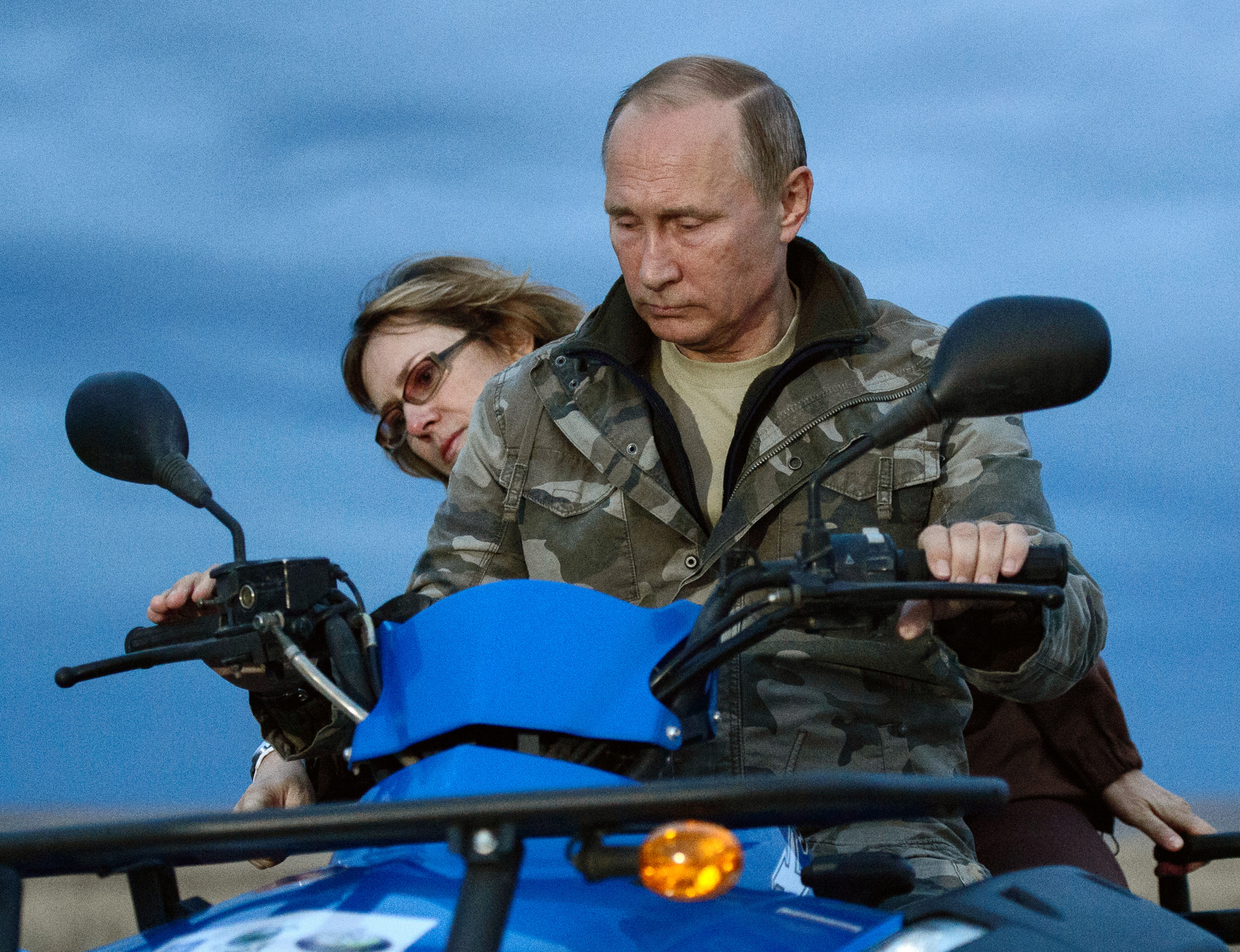 President Vladimir Putin rides a quad bike at the the Orenburgsky nature reserve. Photo / Getty Images